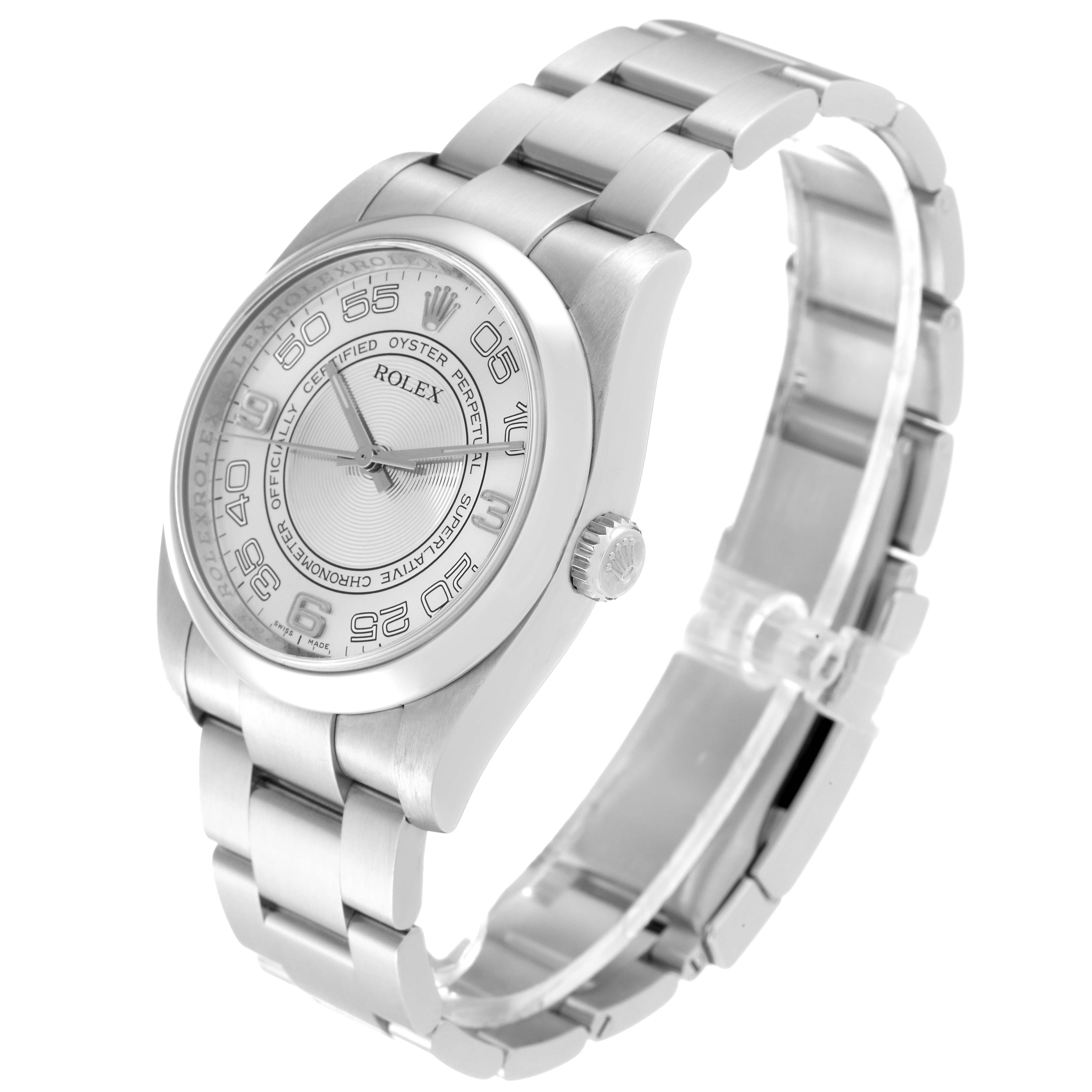 The image shows a side and front view of a Rolex Oyster Perpetual 116000 Men's Stainless Steel Silver Dial 116000 Men's Stainless Steel Silver Dial watch, highlighting the face, bezel, and bracelet.