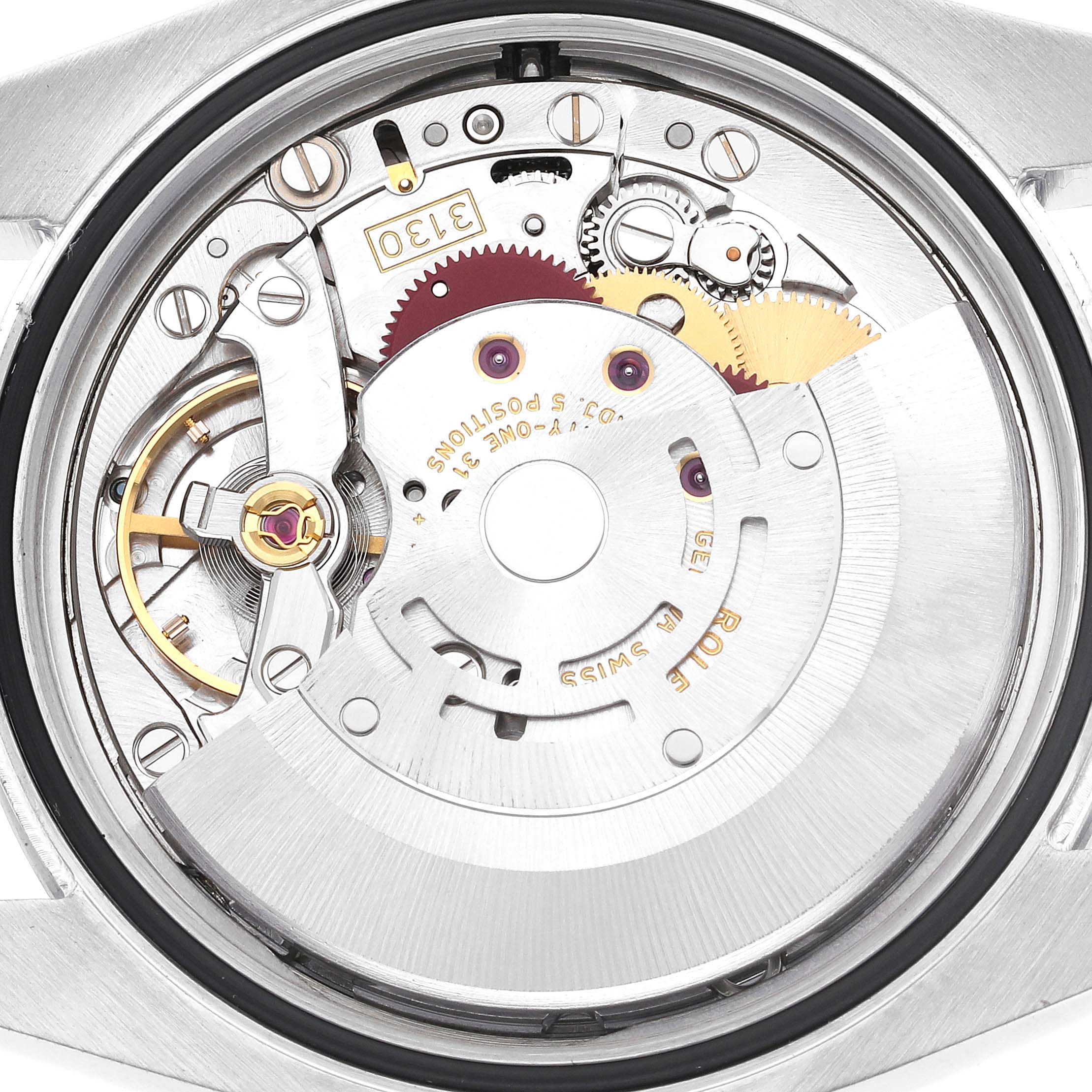 The image shows the inner mechanism of a Rolex Oyster Perpetual 116000 Men's Stainless Steel Silver Dial 116000 Men's Stainless Steel Silver Dial watch viewed from the back.