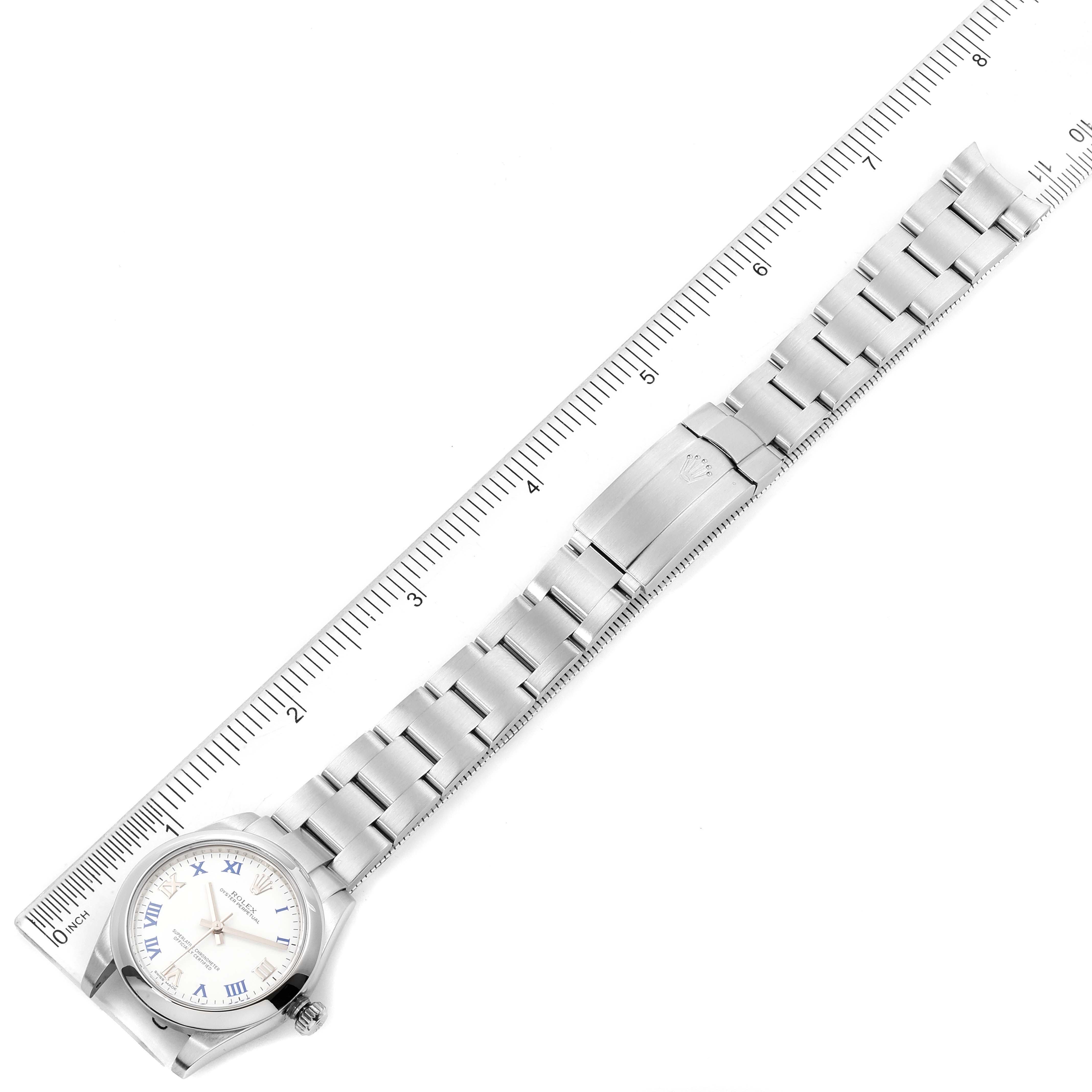 This image shows a Rolex Mid-Size 177200 Women
s Stainless Steel White Dial 177200 Women
s Stainless Steel White Dial watch laid flat next to a ruler, highlighting the entire bracelet and clasp.