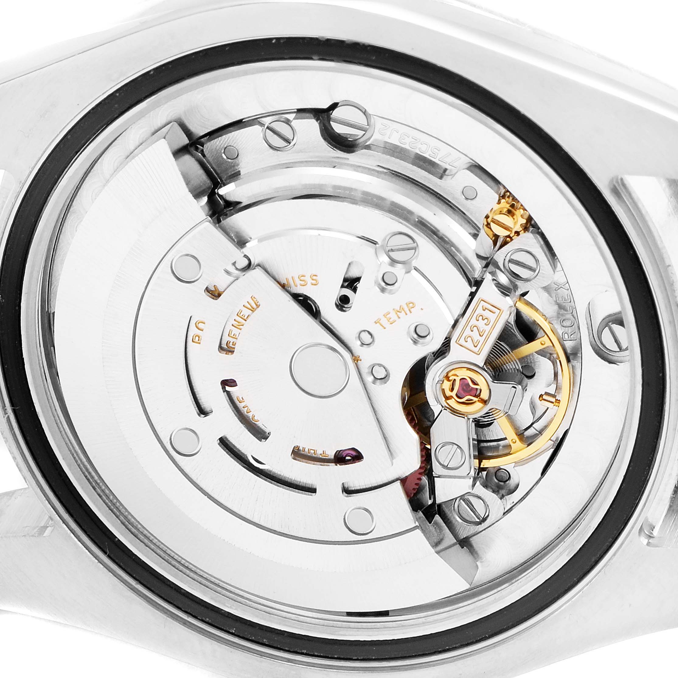 The image shows the internal mechanical movement of a Mid-Size Rolex watch from a close-up, back view angle.