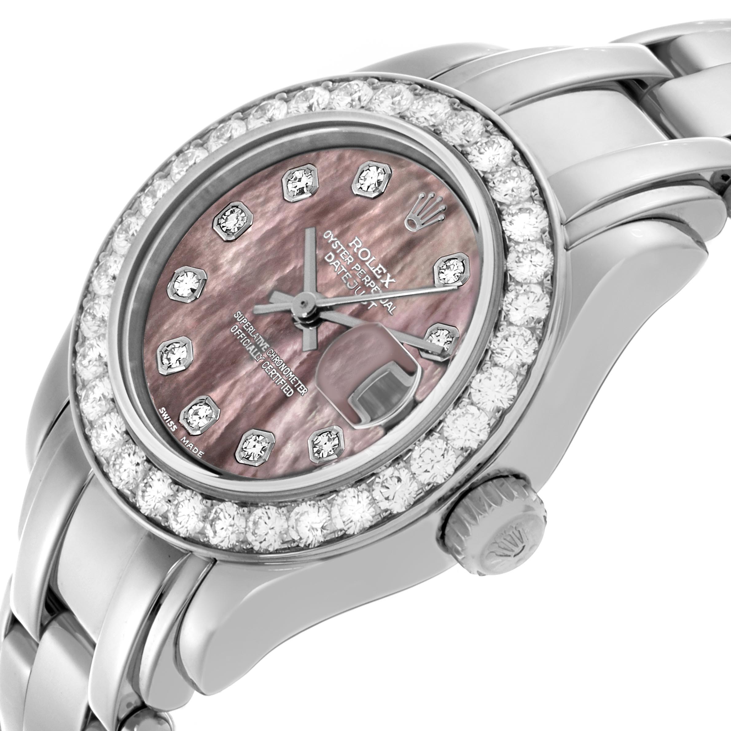 The Rolex Pearlmaster 69299 Women
s White Gold Mother of Pearl Dial 69299 Women
s White Gold Mother of Pearl Dial watch is shown at an angled close-up, featuring its diamond bezel, dial, and bracelet details.