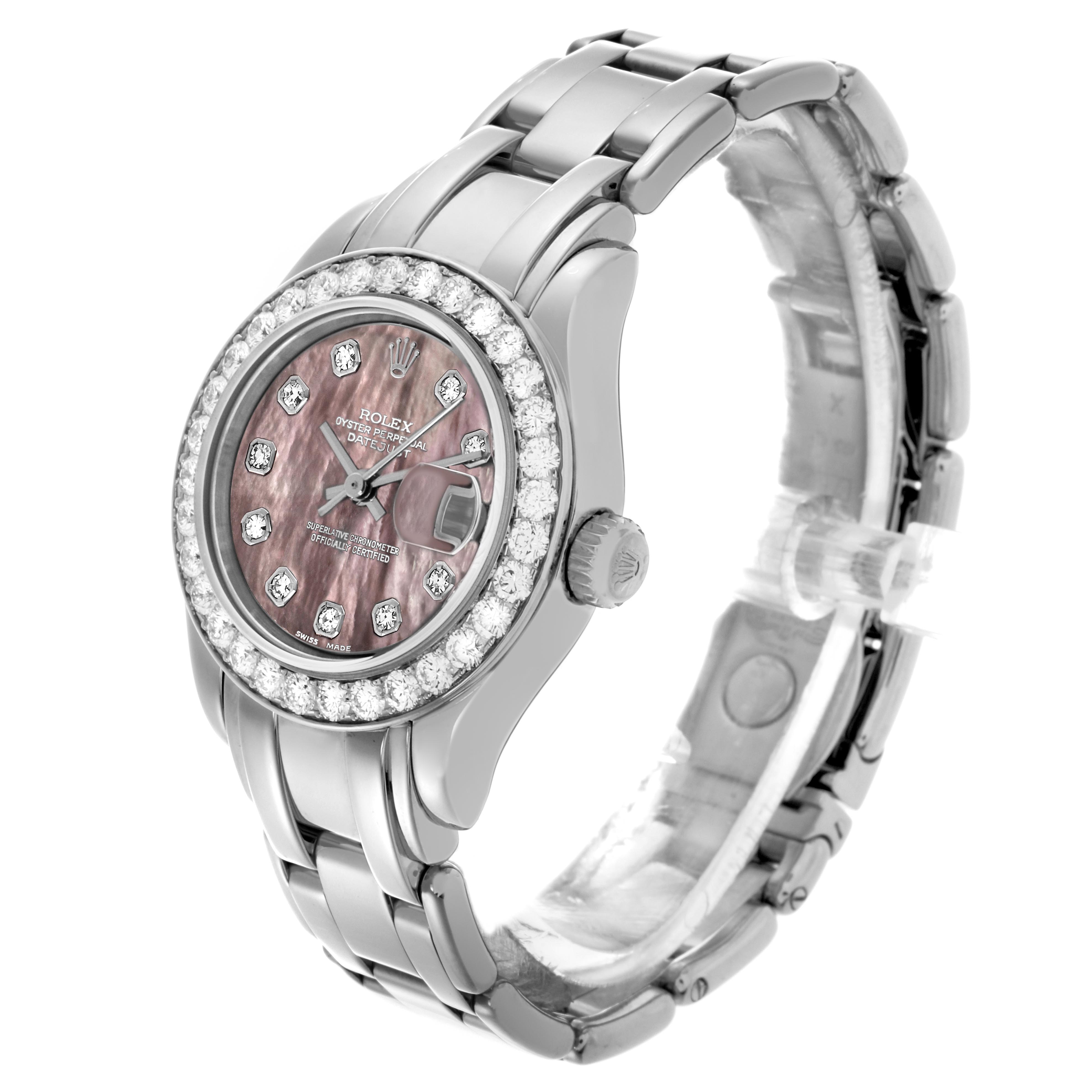 The Rolex Pearlmaster 69299 Women
s White Gold Mother of Pearl Dial 69299 Women
s White Gold Mother of Pearl Dial watch is shown at a three-quarter angle, highlighting its bezel, dial, crown, and bracelet.