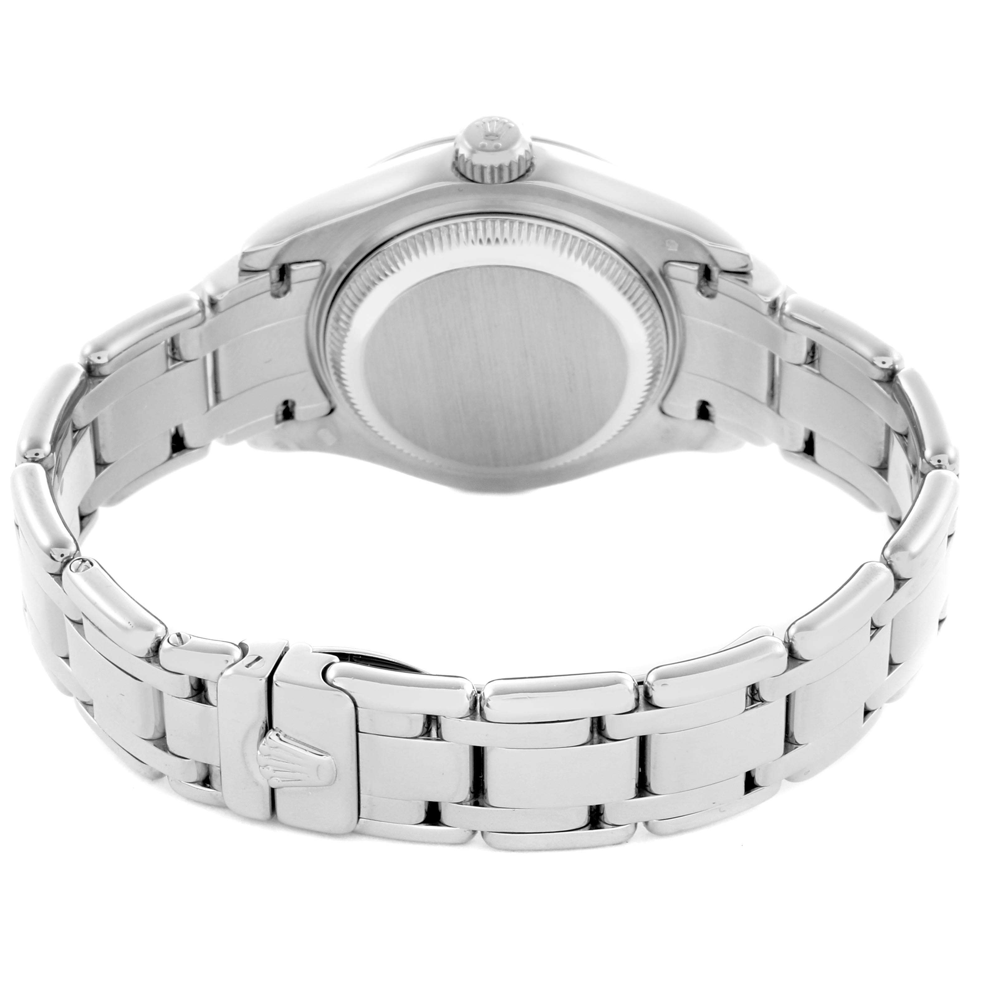 The image shows the back view of a Rolex Pearlmaster 69299 Women
s White Gold Mother of Pearl Dial 69299 Women
s White Gold Mother of Pearl Dial watch, highlighting the case back and metal bracelet.