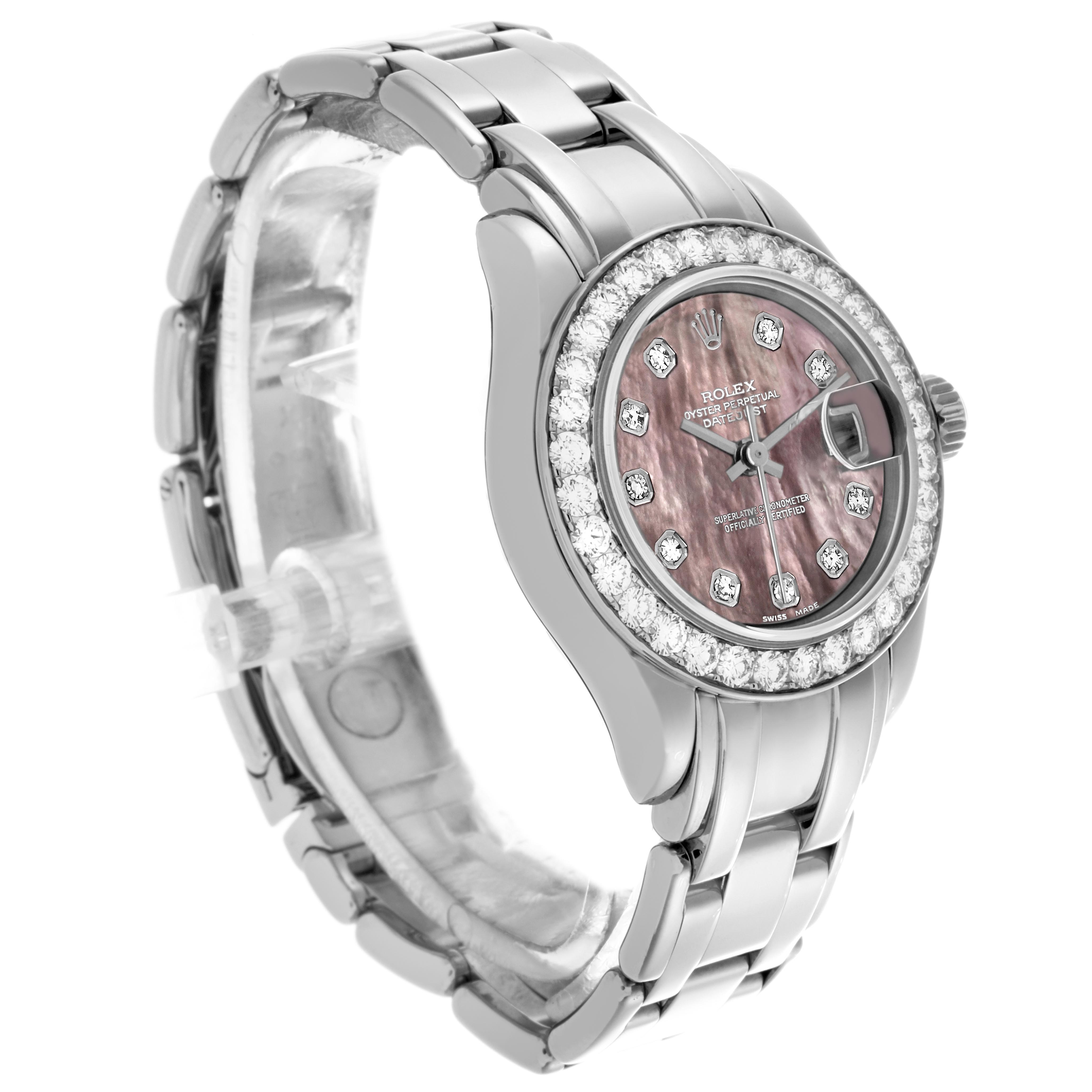 The Rolex Pearlmaster 69299 Women
s White Gold Mother of Pearl Dial 69299 Women
s White Gold Mother of Pearl Dial watch is shown at a slight angle, highlighting the bezel, dial, case, and a portion of the bracelet.