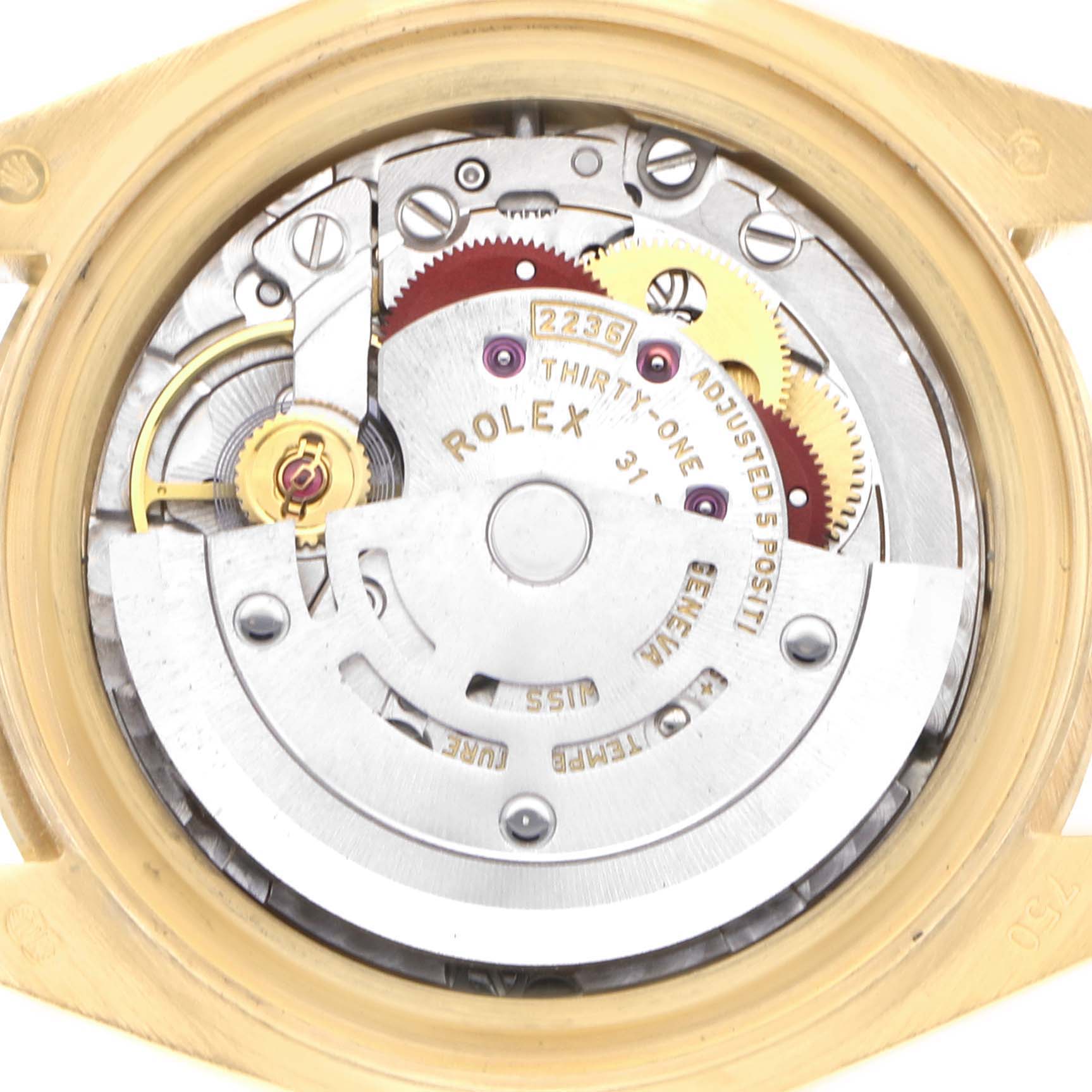The image shows the internal movement of a Rolex President 279178 Women
s Yellow Gold Silver Dial 279178 Women
s Yellow Gold Silver Dial model watch from a top view, highlighting gears and mechanical components.