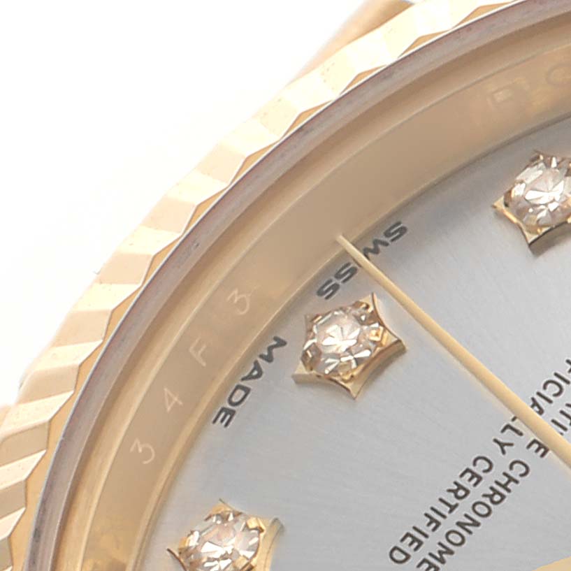 The image shows a close-up of the Rolex President 279178 Women
s Yellow Gold Silver Dial 279178 Women
s Yellow Gold Silver Dial watch, focusing on the bezel, dial, and diamond hour markers from an angled view.