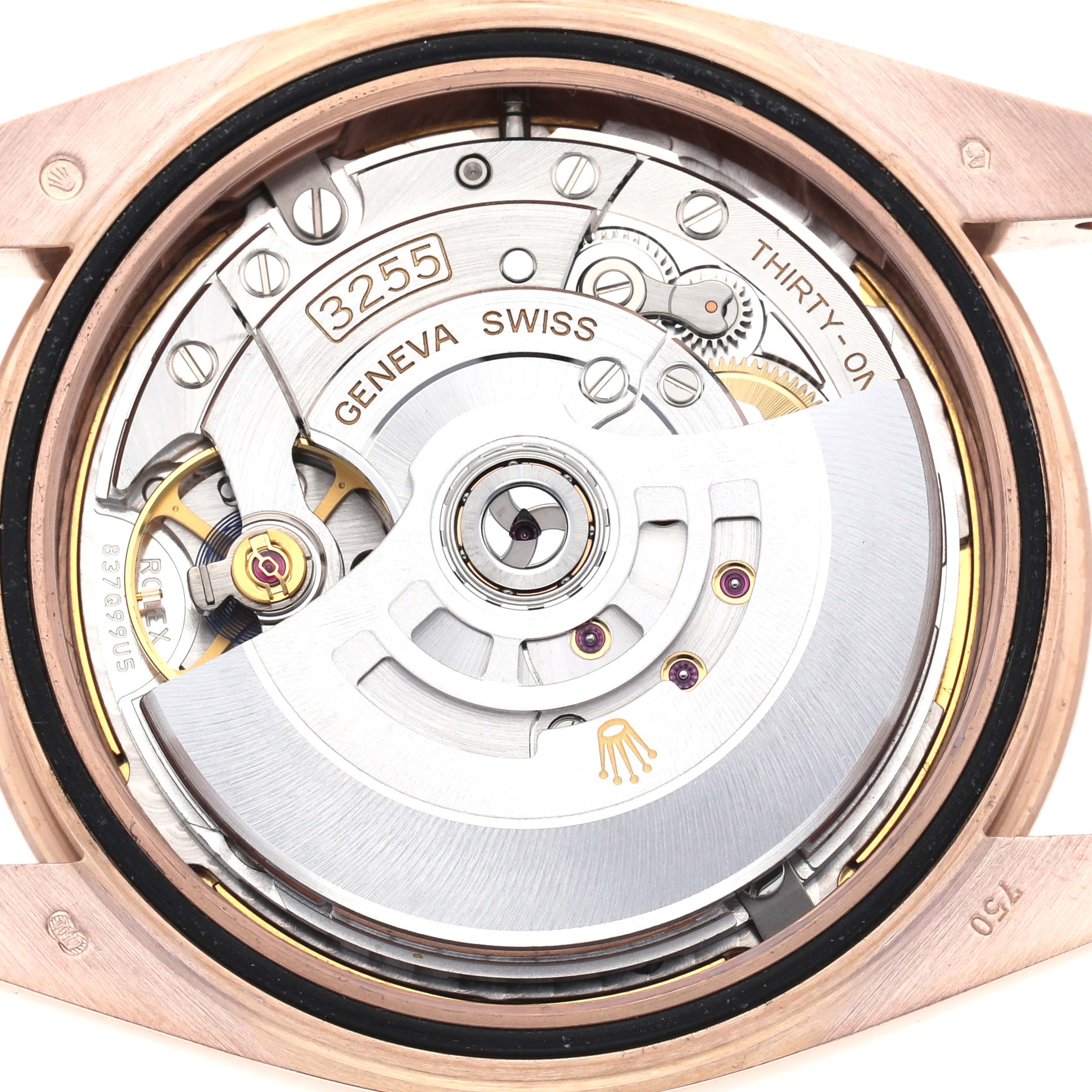 This image shows the internal movement mechanism of a Rolex President 228235 Men's Rose Gold Brown Dial watch, viewed from the back.