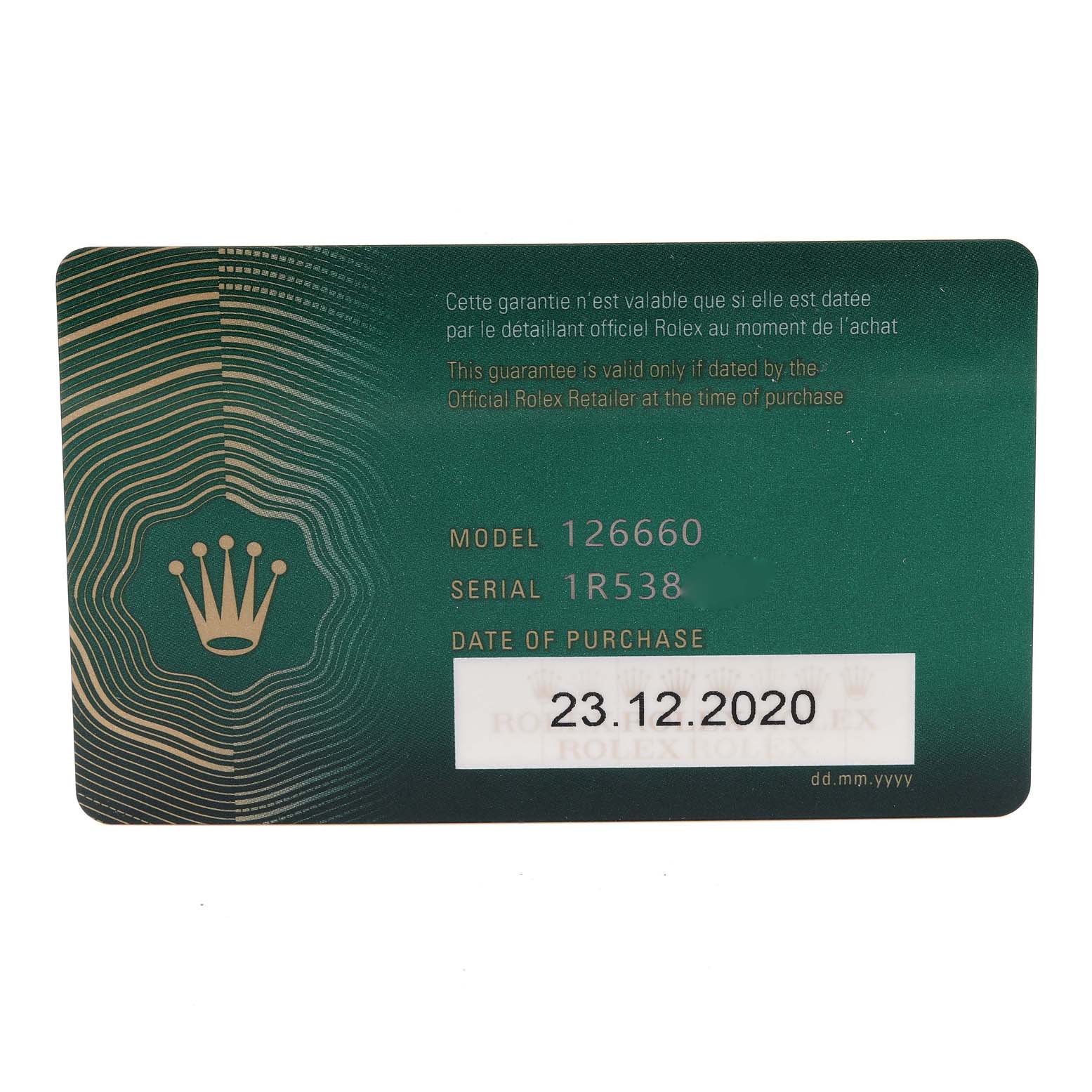 This is a warranty card for the Rolex Sea-Dweller 126660 Men
s Stainless Steel Blue Dial 126660 Men
s Stainless Steel Blue Dial model 126660, showing the serial number and date of purchase.