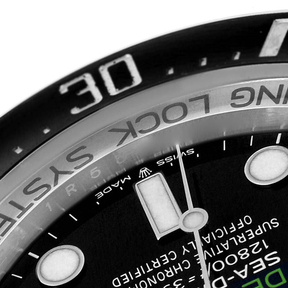 This close-up angle highlights the dial and part of the bezel of the Rolex Sea-Dweller 126660 Men
s Stainless Steel Blue Dial 126660 Men
s Stainless Steel Blue Dial watch.