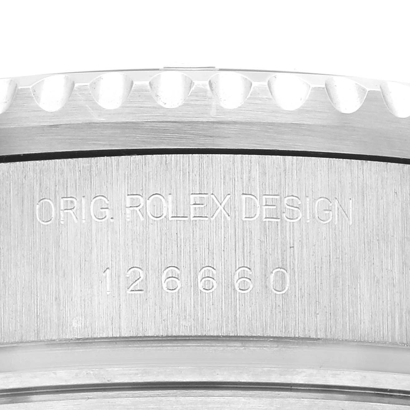 This image shows a close-up of the side of the case of a Rolex Sea-Dweller 126660 Men
s Stainless Steel Blue Dial 126660 Men
s Stainless Steel Blue Dial with the model number and the "ORIG. ROLEX DESIGN" engraving.