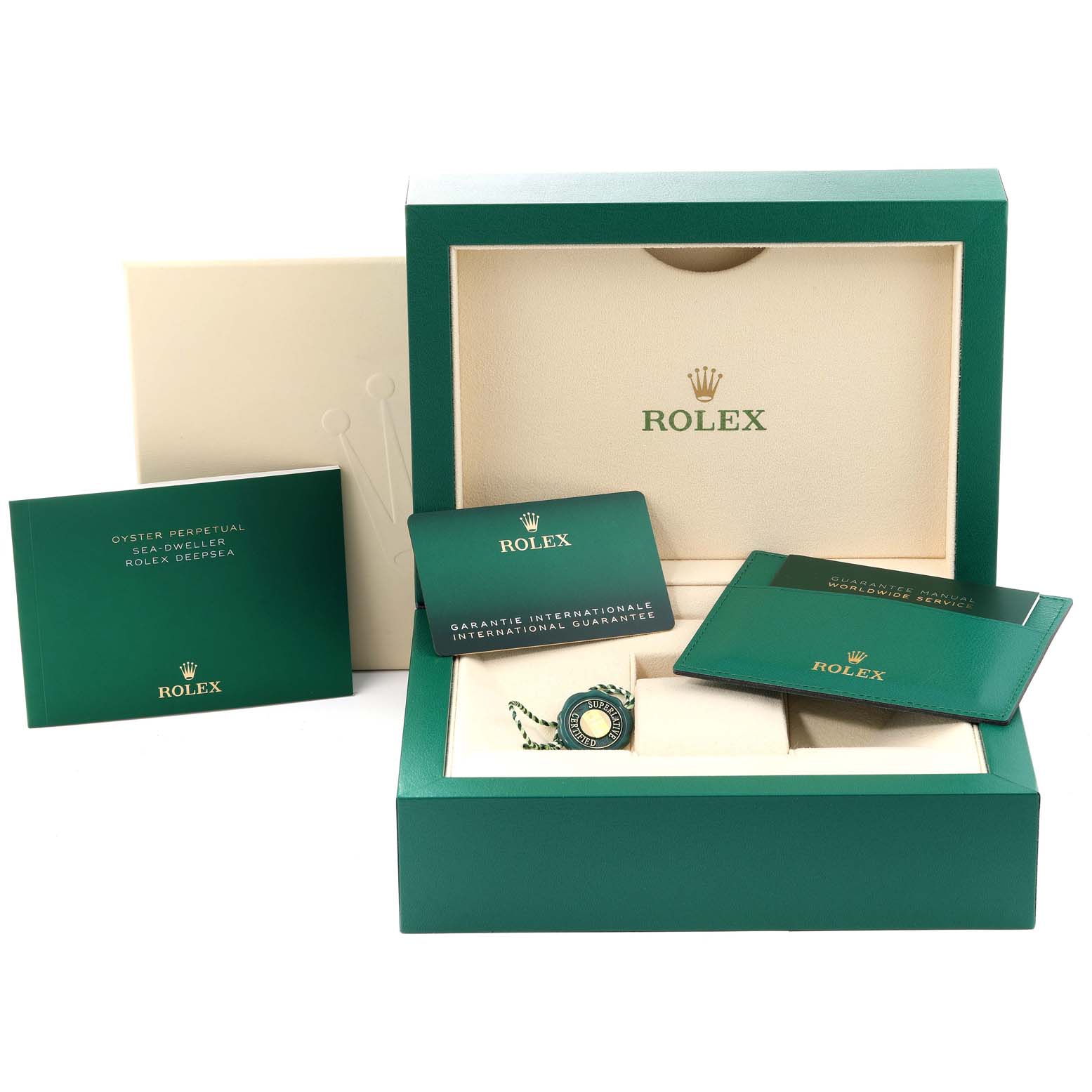 The image shows a Rolex Sea-Dweller 126660 Men
s Stainless Steel Blue Dial 126660 Men
s Stainless Steel Blue Dial watch box, guarantee card holder, and associated booklets from a front angle.