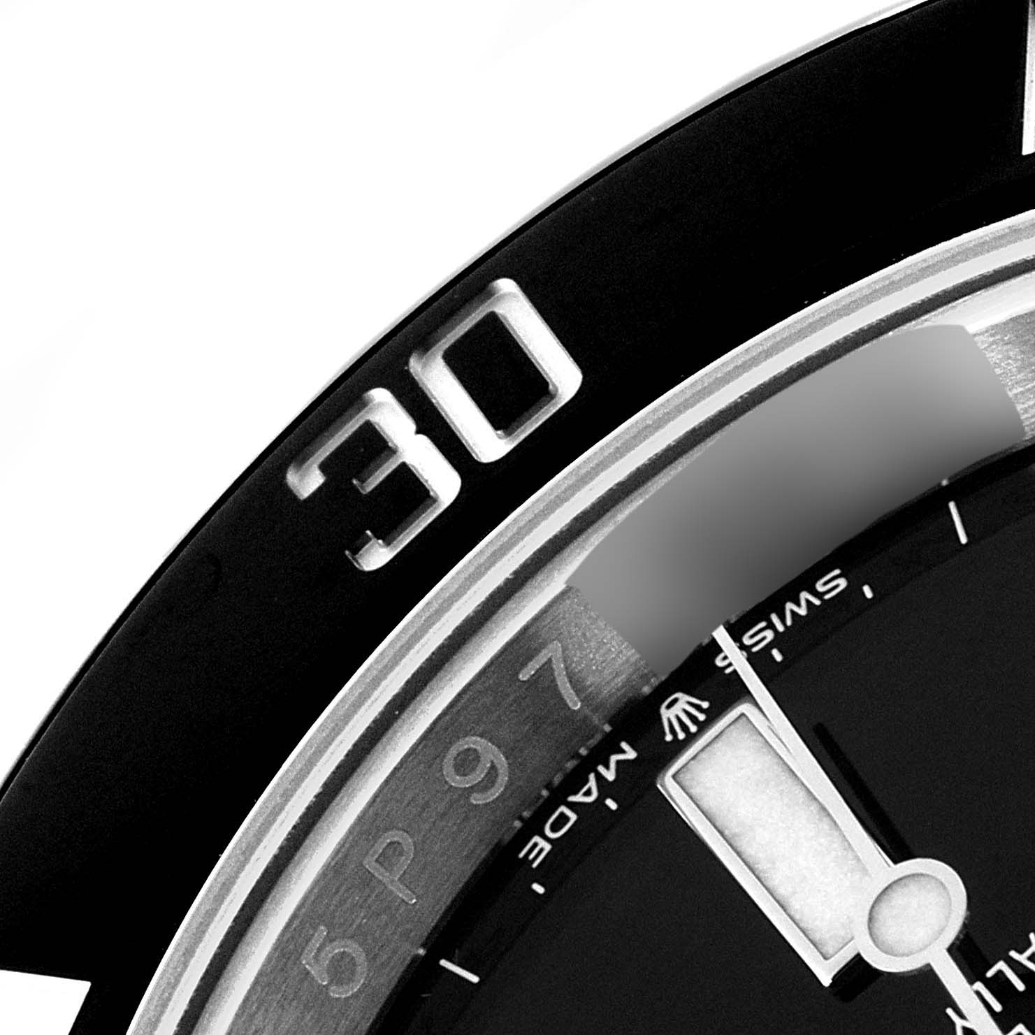 The image shows a close-up of the bezel and part of the dial of a Rolex Submariner 126610 Men
s Stainless Steel Black Dial 126610 Men
s Stainless Steel Black Dial watch, highlighting the 30-minute marker.