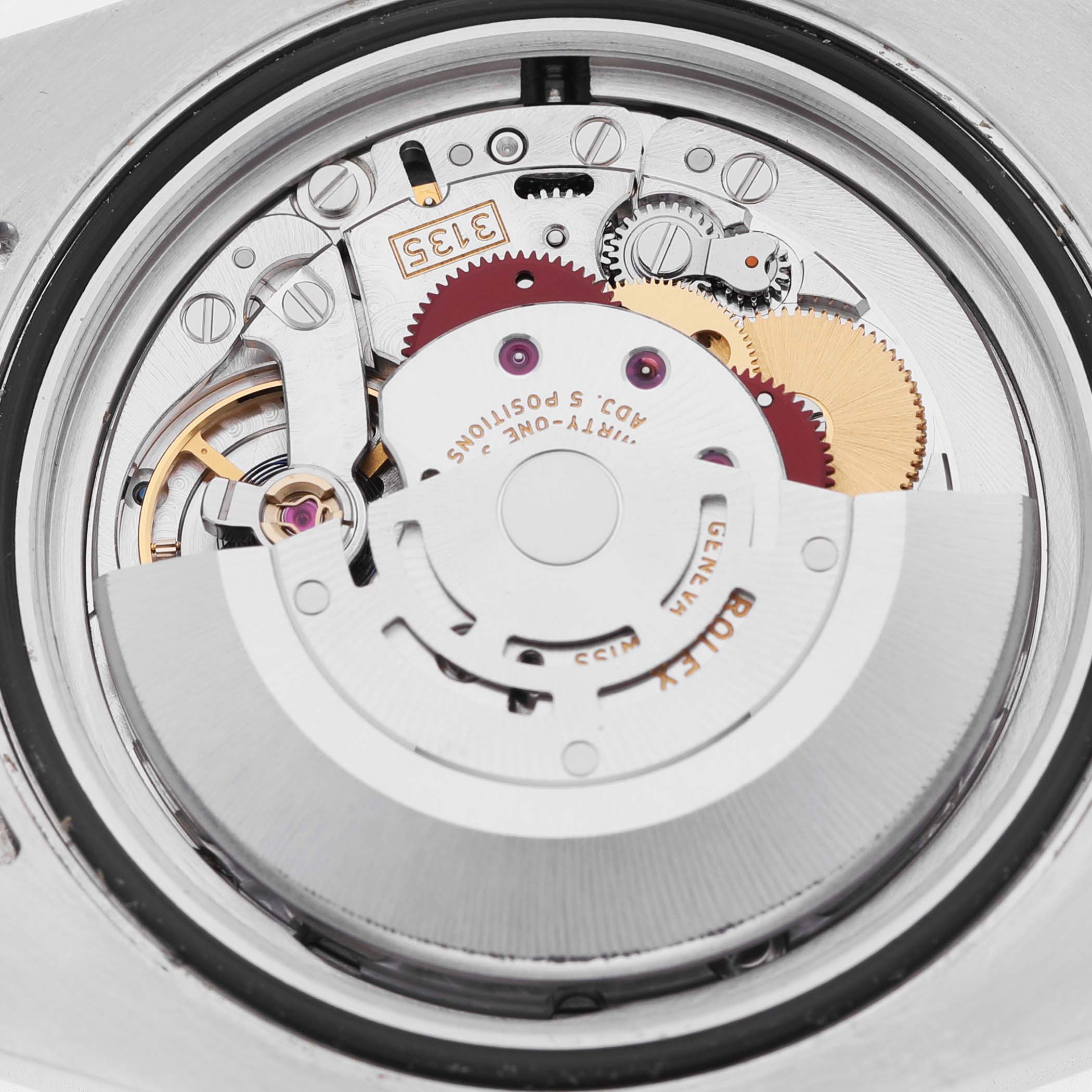 The image shows the movement and inner mechanism of a Rolex Submariner 116610LV Men's Stainless Steel Green Dial watch from a top-down angle.