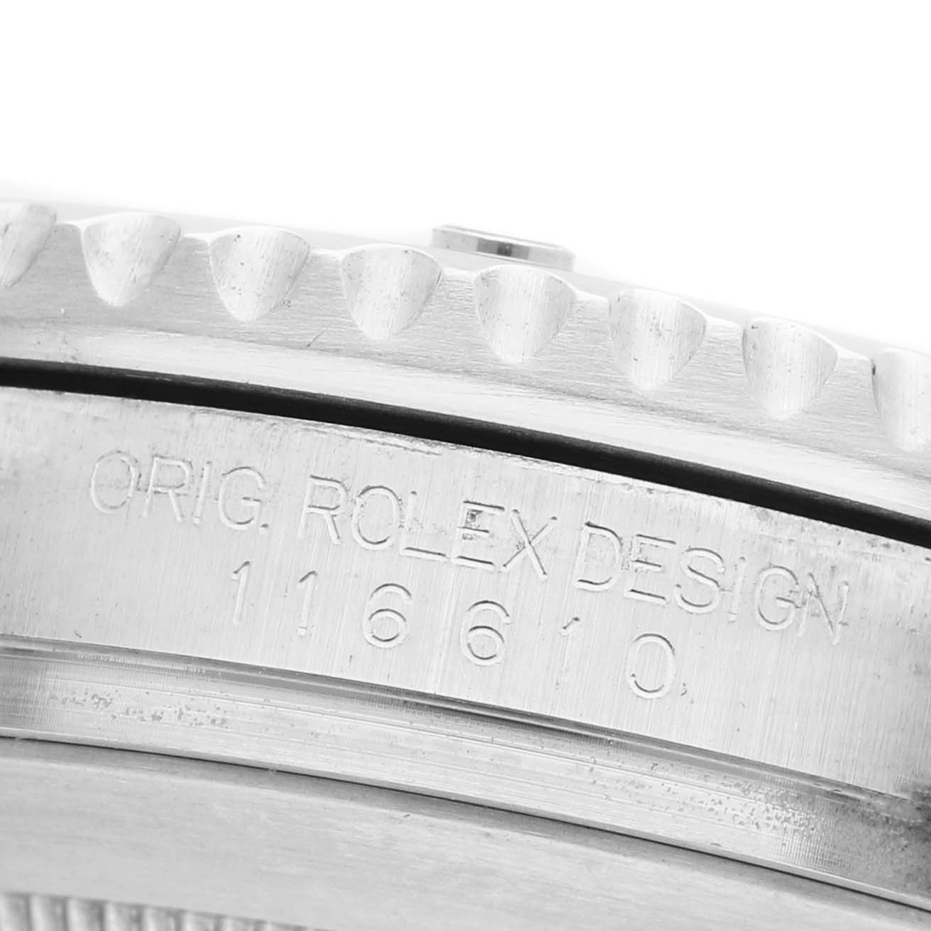 The image shows a close-up of the side of a Rolex Submariner 116610LV Men's Stainless Steel Green Dial, focusing on the model number engraving.