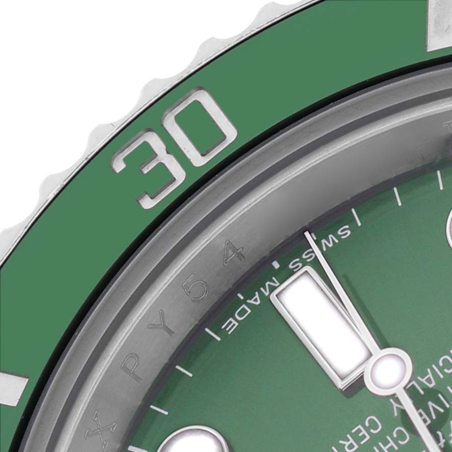 The image shows a close-up of the green bezel and dial with a minute marker of the Rolex Submariner 116610LV Men's Stainless Steel Green Dial model.