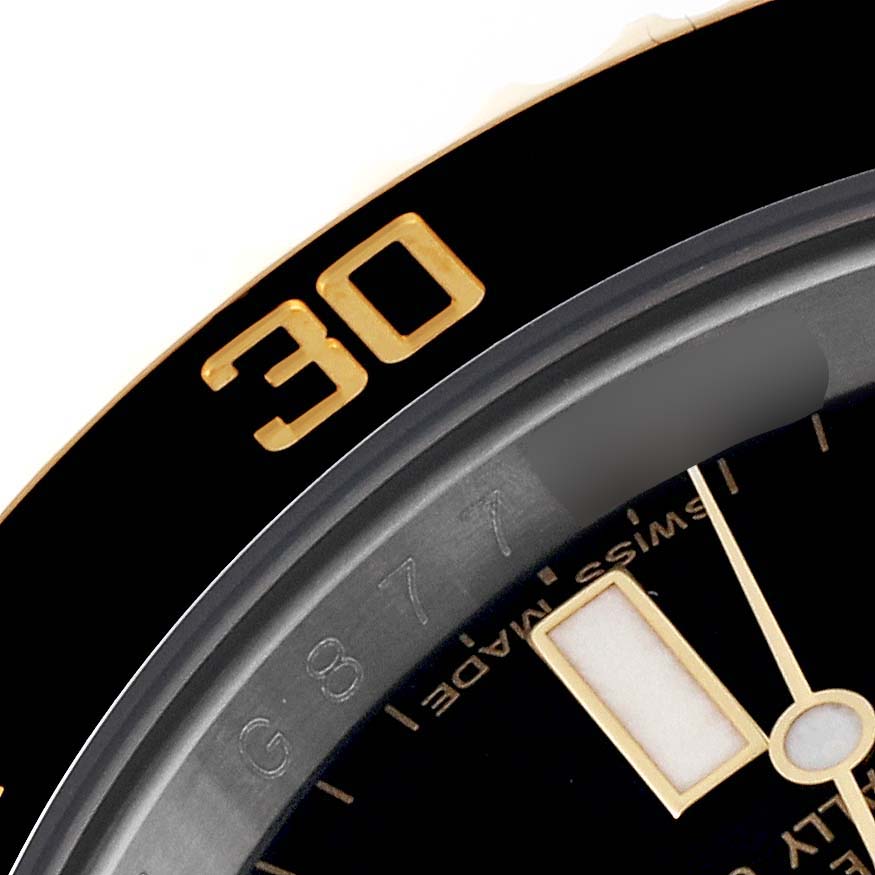 The image shows a close-up of the bezel and part of the dial of a Rolex Submariner 116613 Men's Steel and Gold (two tone) Black Dial 116613 Men's Steel and Gold (two tone) Black Dial watch, highlighting the number "30."