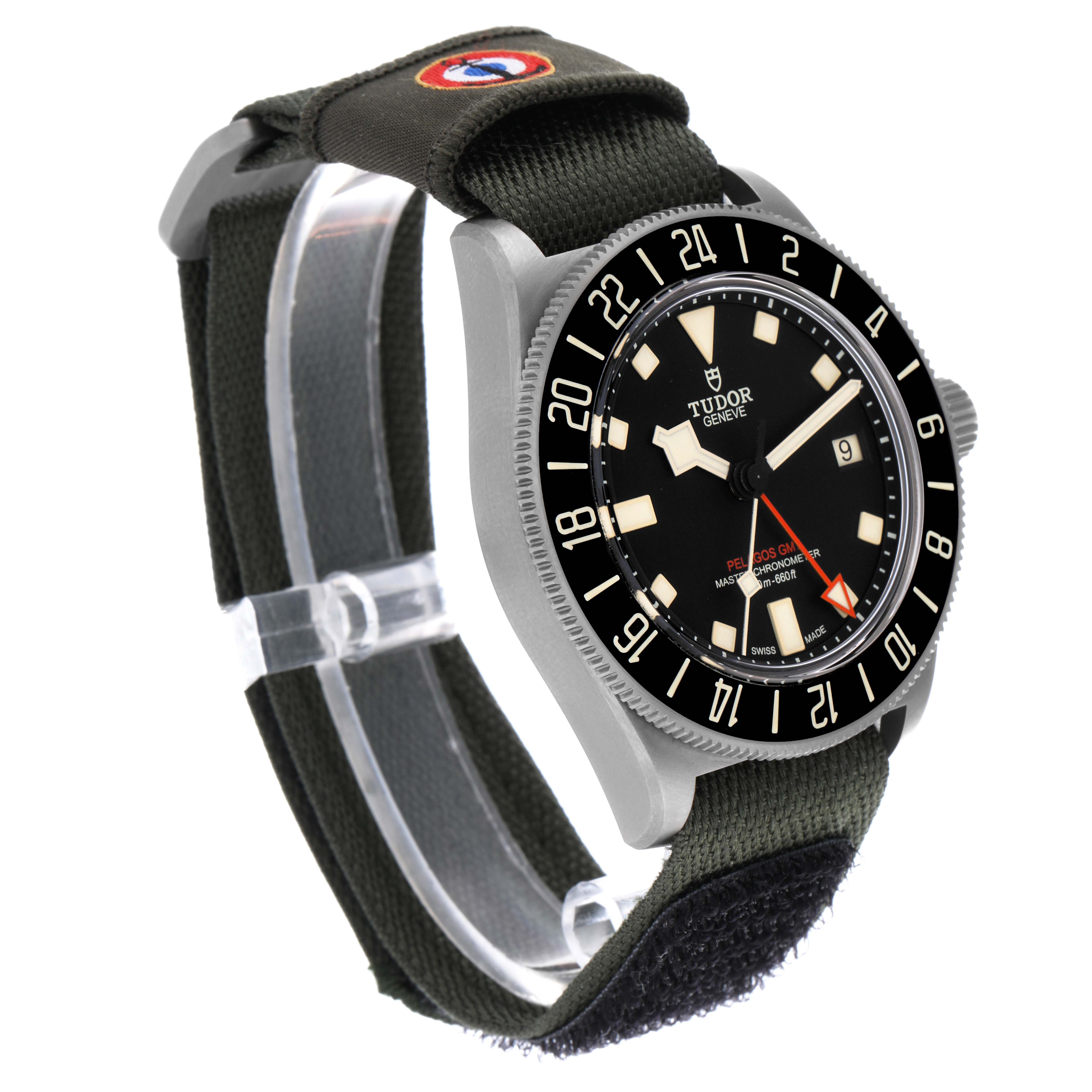 The Tudor Pelagos 2542G247NU-0001 Men
s Titanium Black Dial 2542G247NU-0001 Men
s Titanium Black Dial watch is shown at a three-quarter angle, highlighting the dial, bezel, and fabric strap.