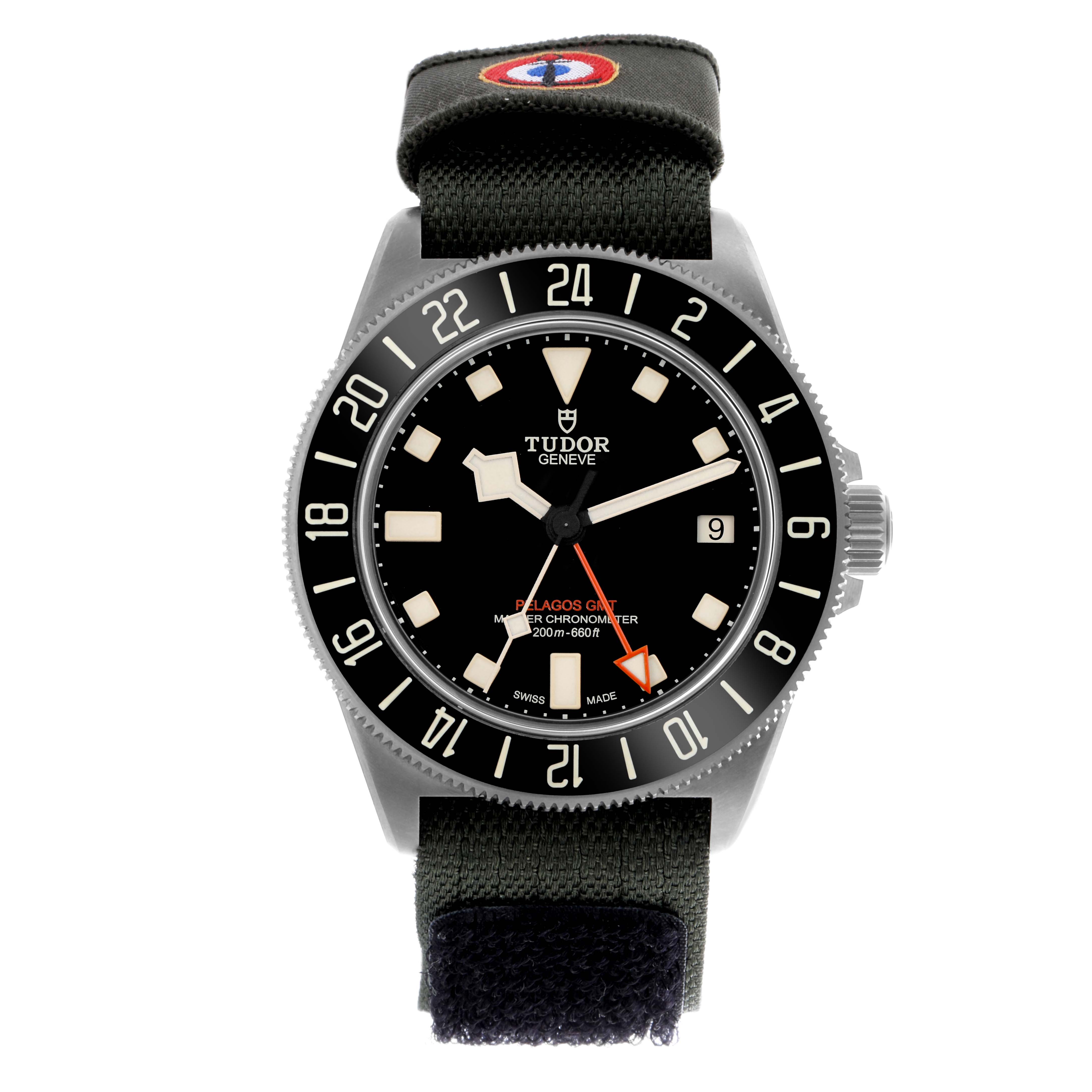 The Tudor Pelagos 2542G247NU-0001 Men
s Titanium Black Dial 2542G247NU-0001 Men
s Titanium Black Dial watch is shown from a front angle, highlighting the dial, bezel, and fabric strap.