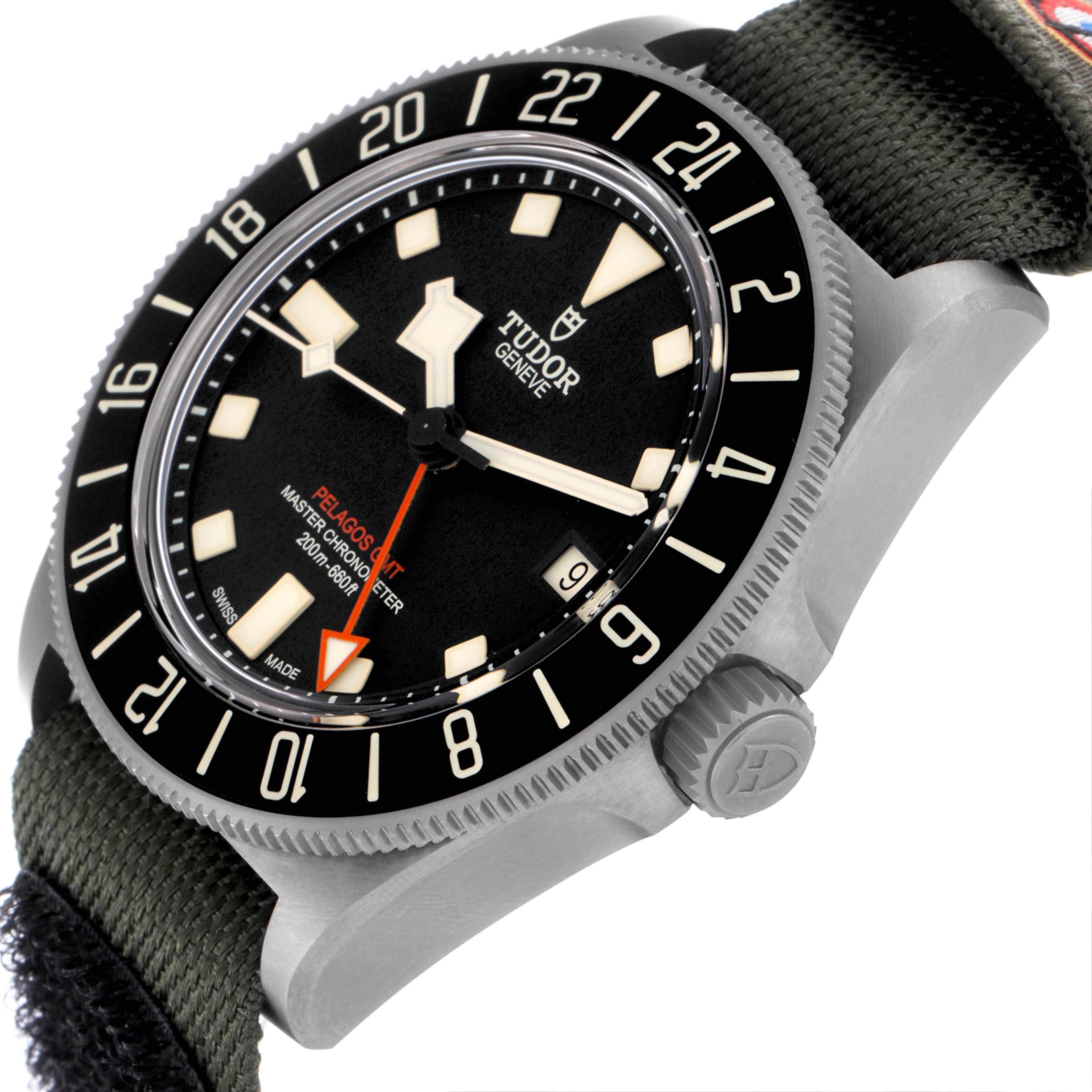 The Tudor Pelagos 2542G247NU-0001 Men
s Titanium Black Dial 2542G247NU-0001 Men
s Titanium Black Dial watch is shown from a side angle, highlighting the face, bezel, crown, and fabric strap.