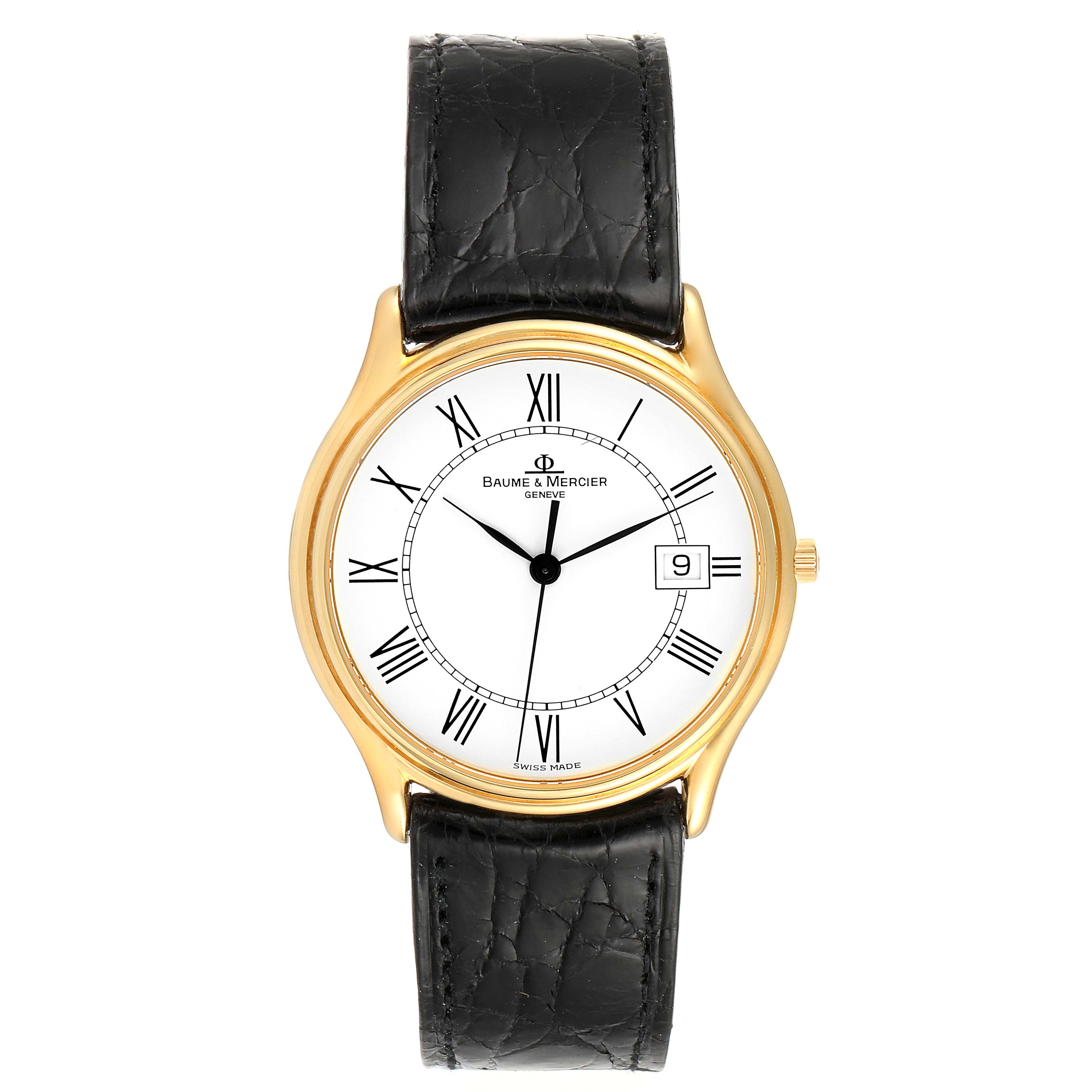 This image shows a front view of a Baume & Mercier Classima MV045236 Men's Yellow Gold White Dial MV045236 Men's Yellow Gold White Dial watch with a black leather strap and gold-case.