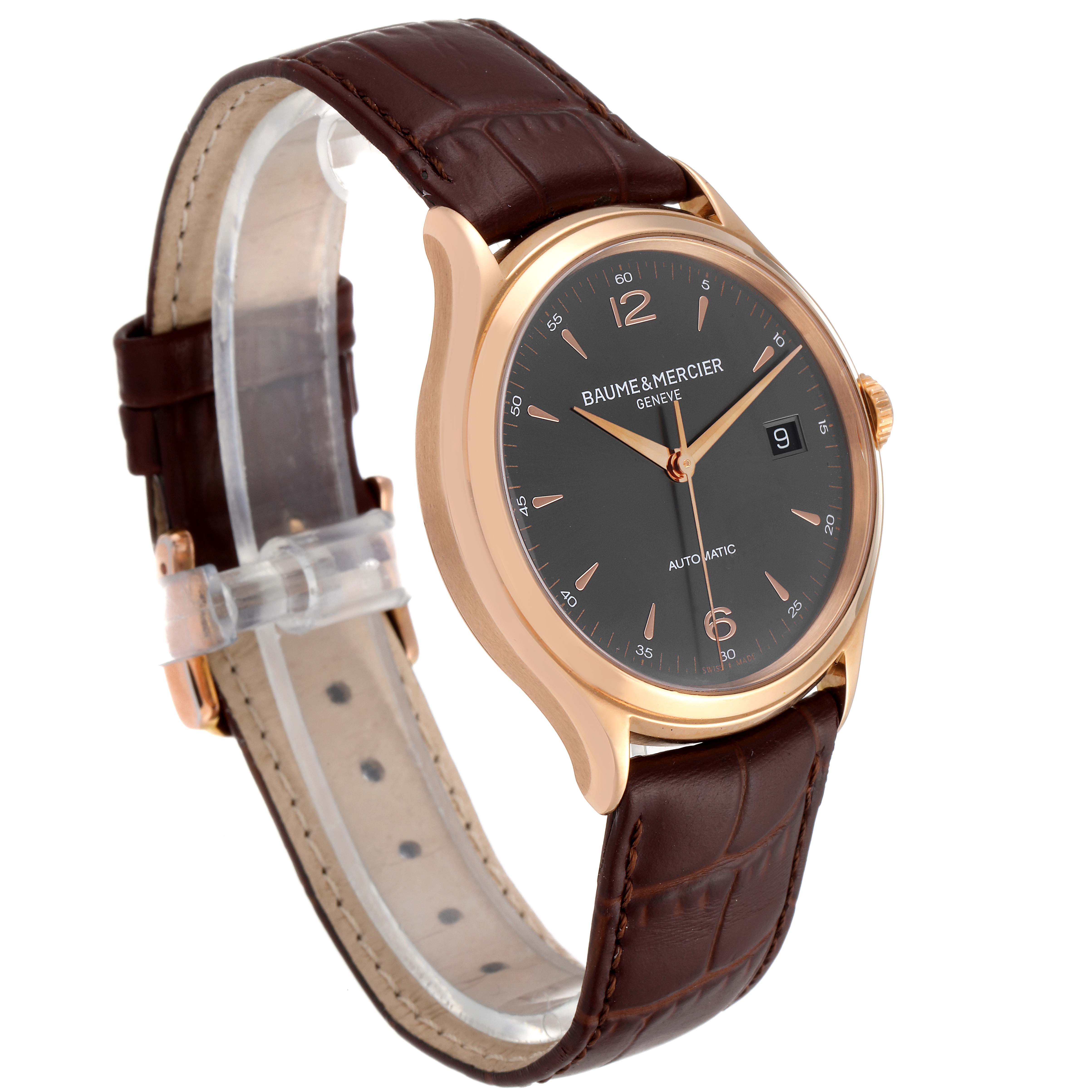 The image shows a side angle of the Baume & Mercier Clifton M0A10059 Men's Rose Gold Grey Dial M0A10059 Men's Rose Gold Grey Dial watch, highlighting the dial, case, and leather strap.