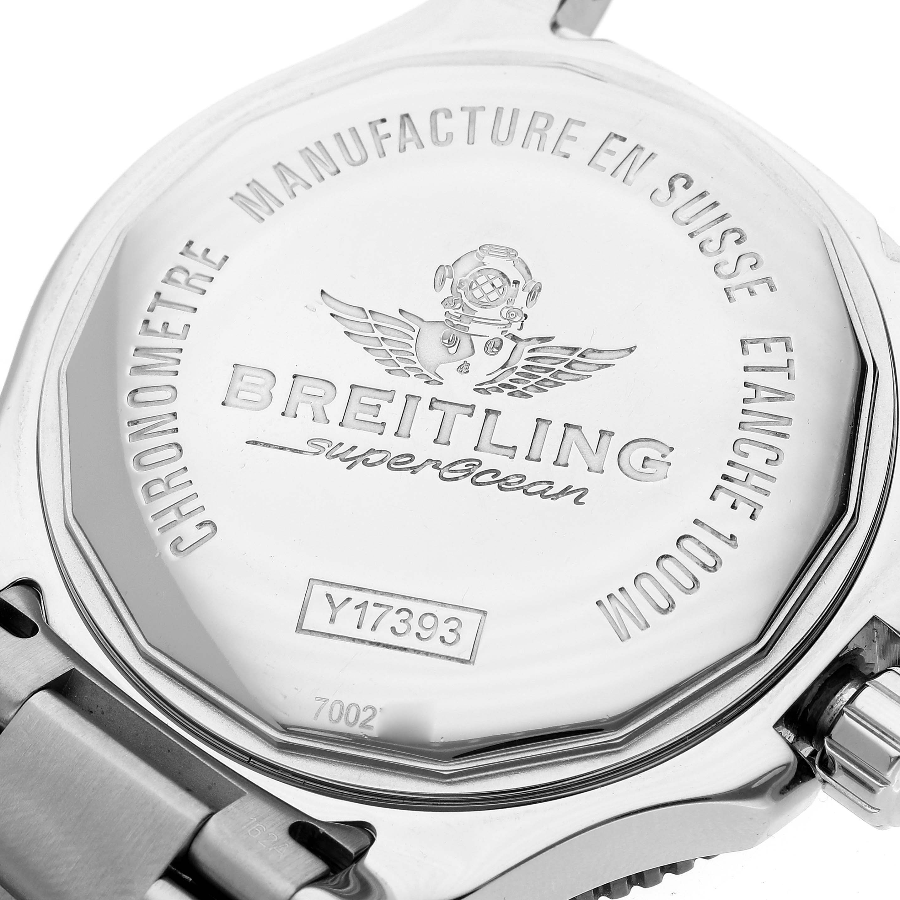 The image shows the back case of the Breitling Superocean Y1739316/C959 Men's Stainless Steel Blue Dial Y1739316/C959 Men's Stainless Steel Blue Dial watch, highlighting its engravings and part of the bracelet.