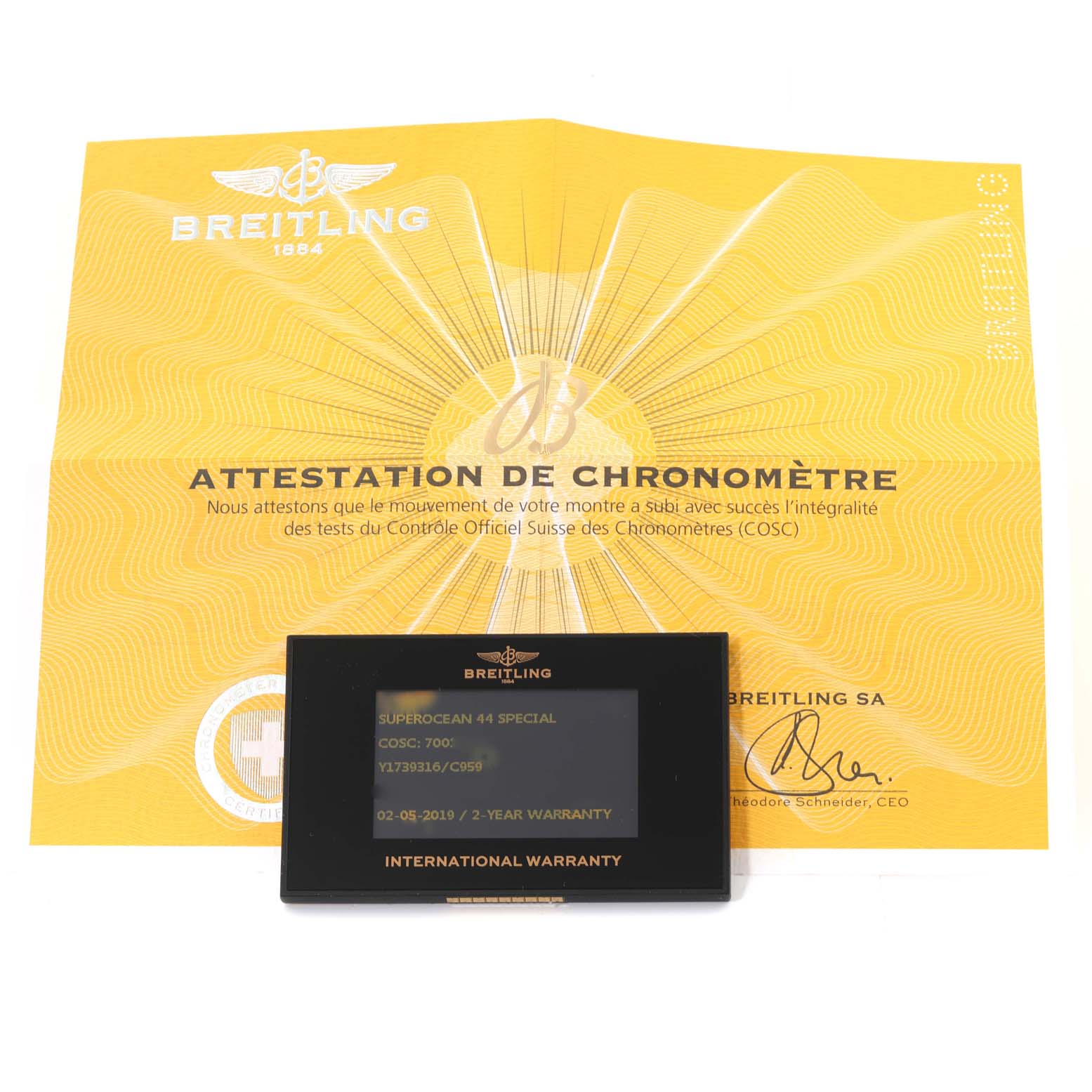 The image shows the certification and warranty card for a Breitling Superocean Y1739316/C959 Men's Stainless Steel Blue Dial Y1739316/C959 Men's Stainless Steel Blue Dial watch, taken from a top-down angle.