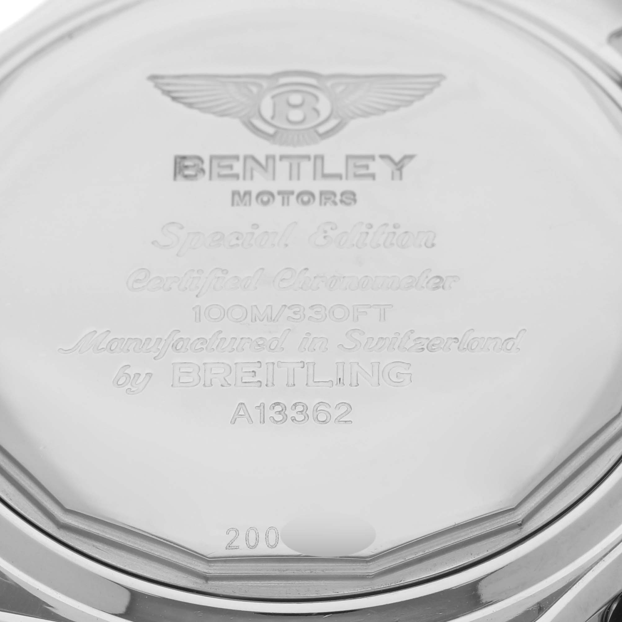 The image shows the back case of a Bentley model by Breitling, featuring engravings and logos.