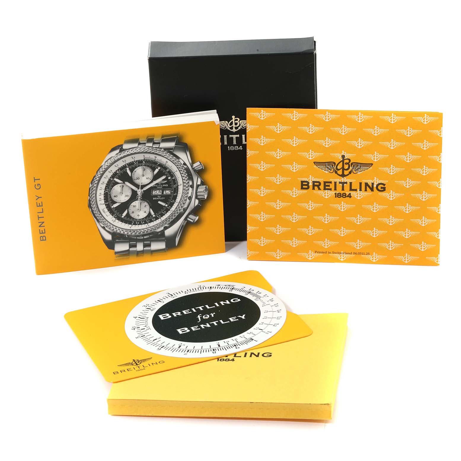 The image shows the instruction manual, warranty card, and packaging for the Breitling Bentley A13362 Men's Stainless Steel Red Dial A13362 Men's Stainless Steel Red Dial model watch.