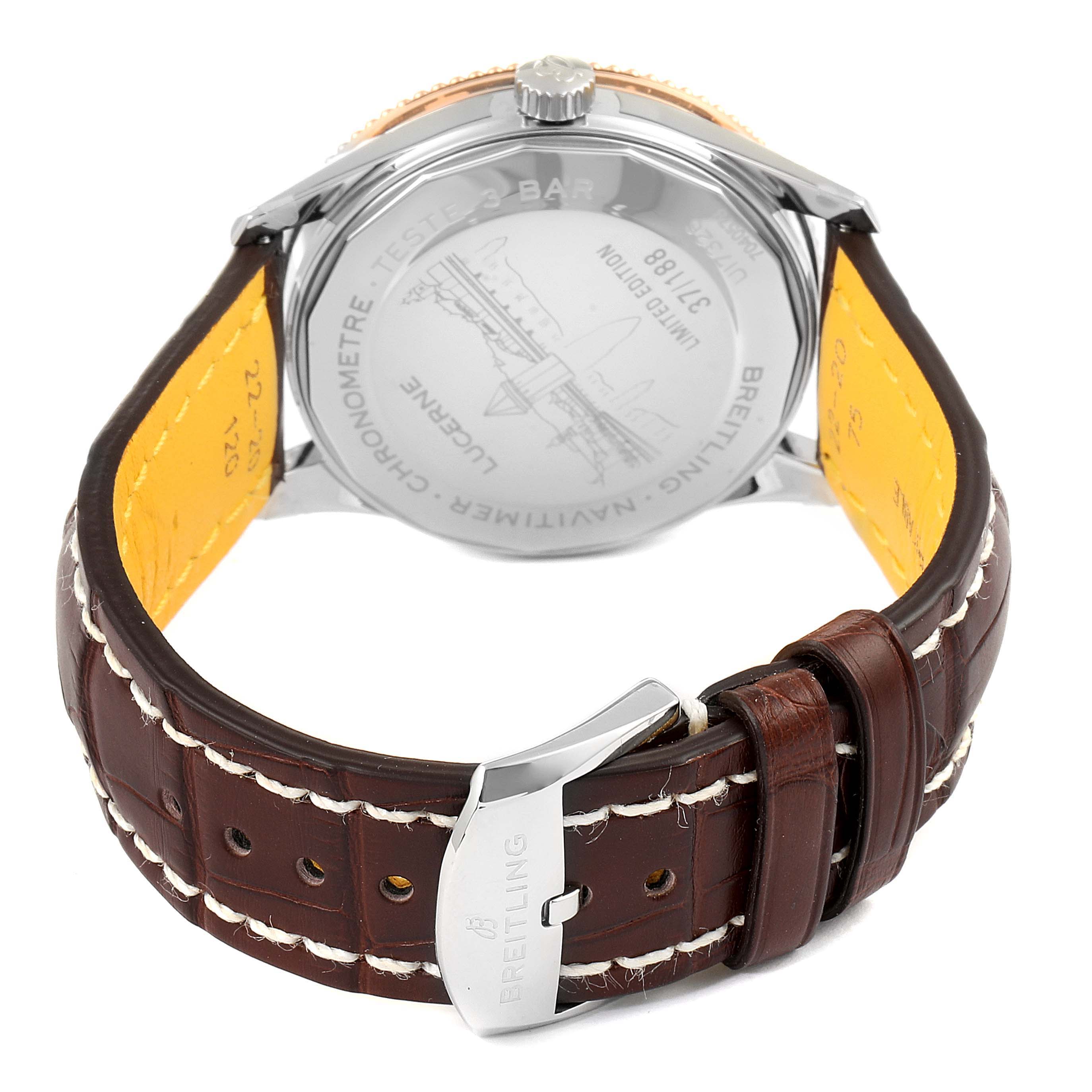 The image shows the back case and brown leather strap of a Breitling Navitimer U17326211M1P1 Men
s Stainless Steel Grey Dial U17326211M1P1 Men
s Stainless Steel Grey Dial watch at an angle focused on the clasp and case back.