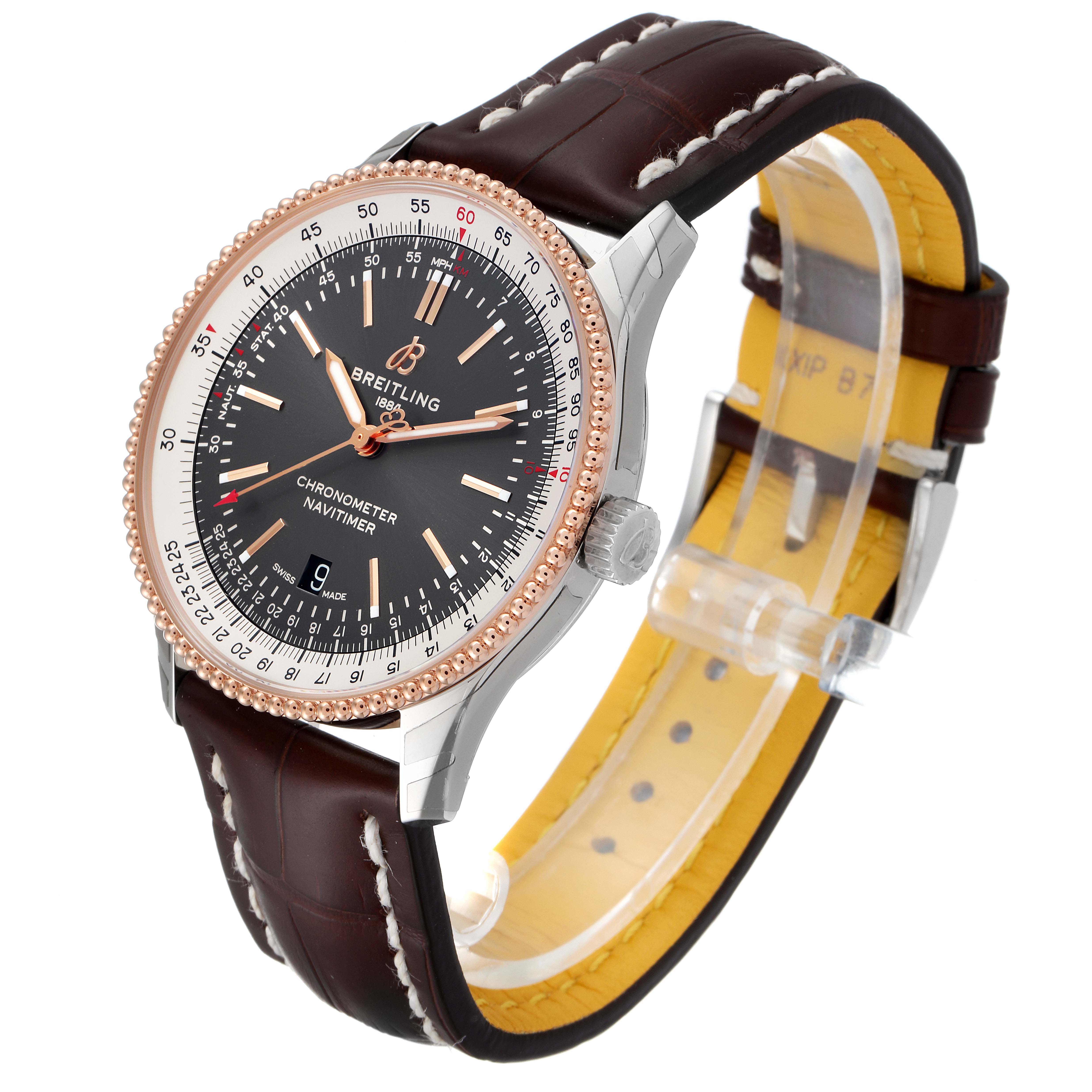 The Breitling Navitimer U17326211M1P1 Men's Stainless Steel Grey Dial U17326211M1P1 Men's Stainless Steel Grey Dial watch is shown at a three-quarter angle, displaying the face, case, crown, and brown leather strap.