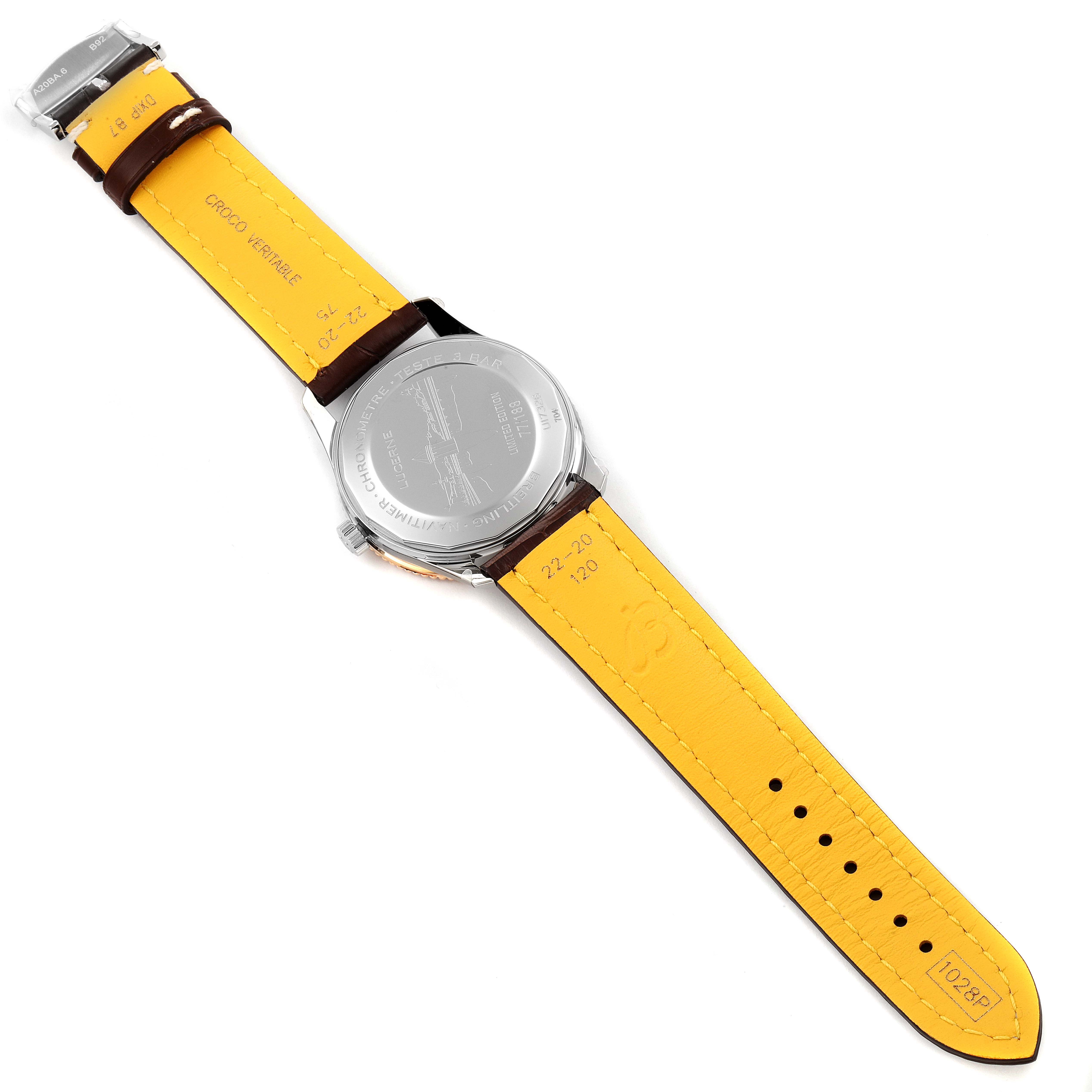 This image shows the back case and yellow underside of the leather strap of a Breitling Navitimer U17326211M1P1 Men's Stainless Steel Grey Dial U17326211M1P1 Men's Stainless Steel Grey Dial watch.