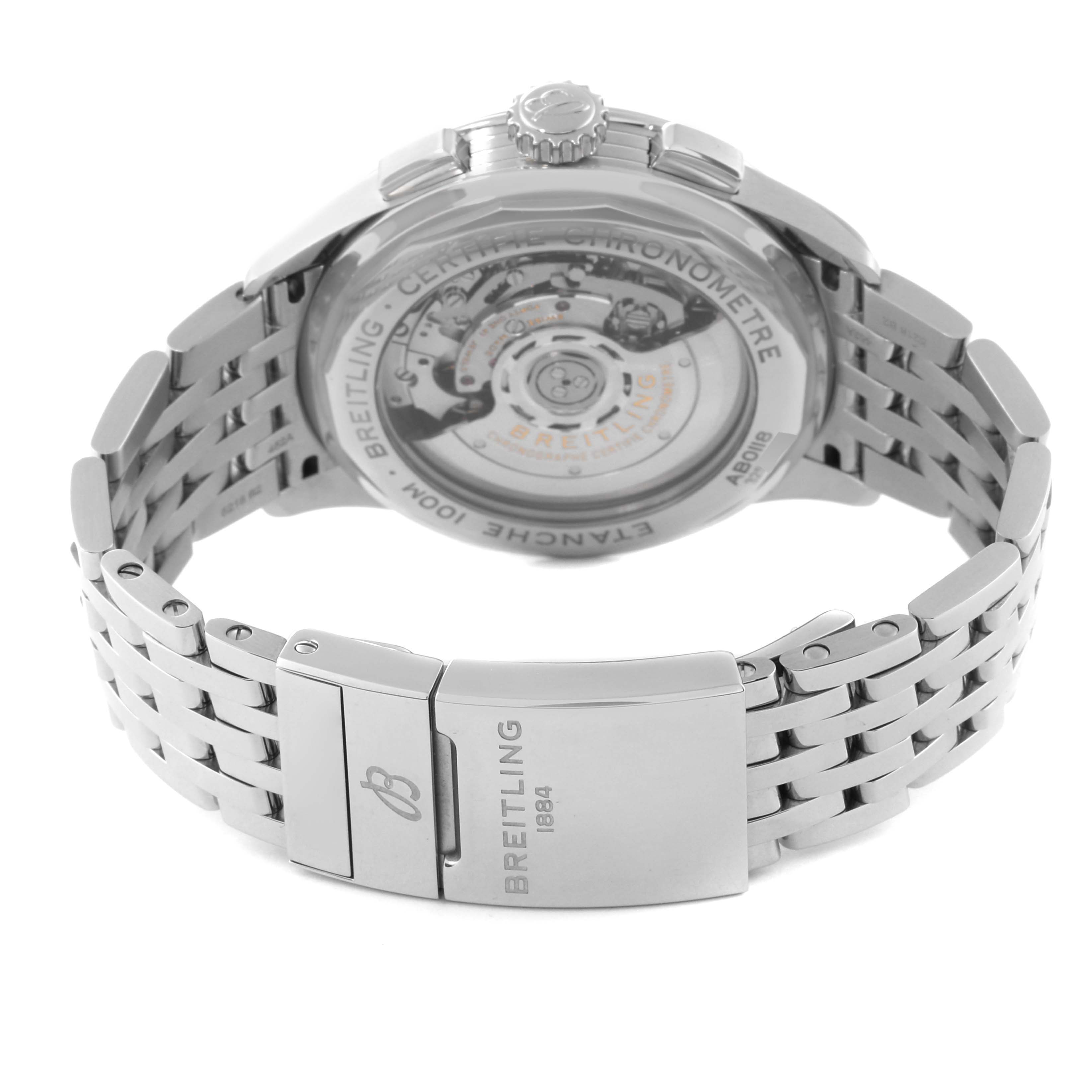 The image shows the back and bracelet of the Breitling Premier AB0118 Men's Stainless Steel Silver Dial AB0118 Men's Stainless Steel Silver Dial watch, highlighting the engraved clasp and exposed movement.