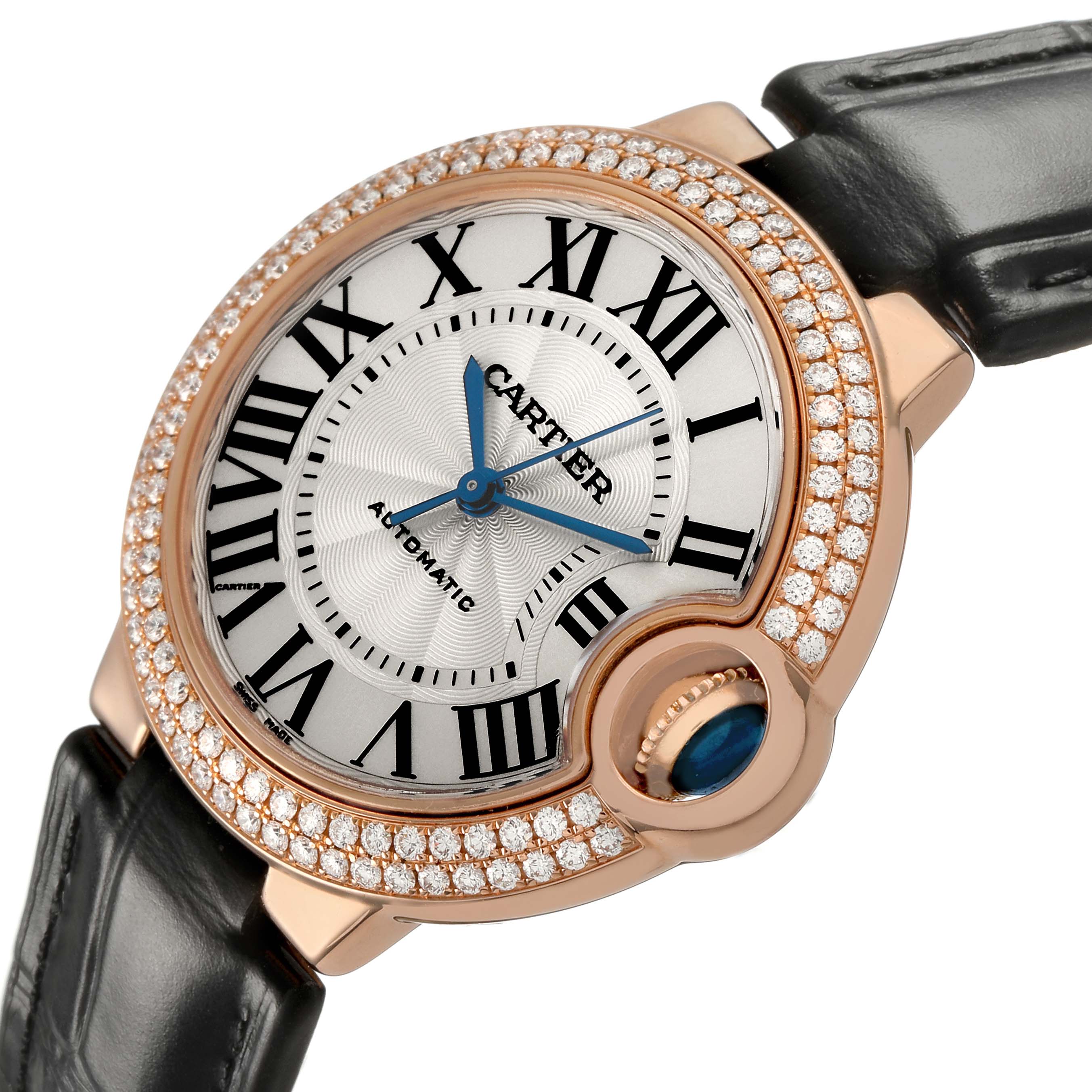 The Cartier Ballon Bleu WE902066 Women's Rose Gold Silver Dial watch is shown at an angle highlighting the face, bezel, and crown with diamond accents.