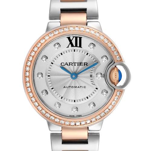 The Cartier Ballon Bleu WE902077 Women's Steel and Gold (two tone) Silver Dial watch is shown from the front, displaying its dial, bezel, and crown.