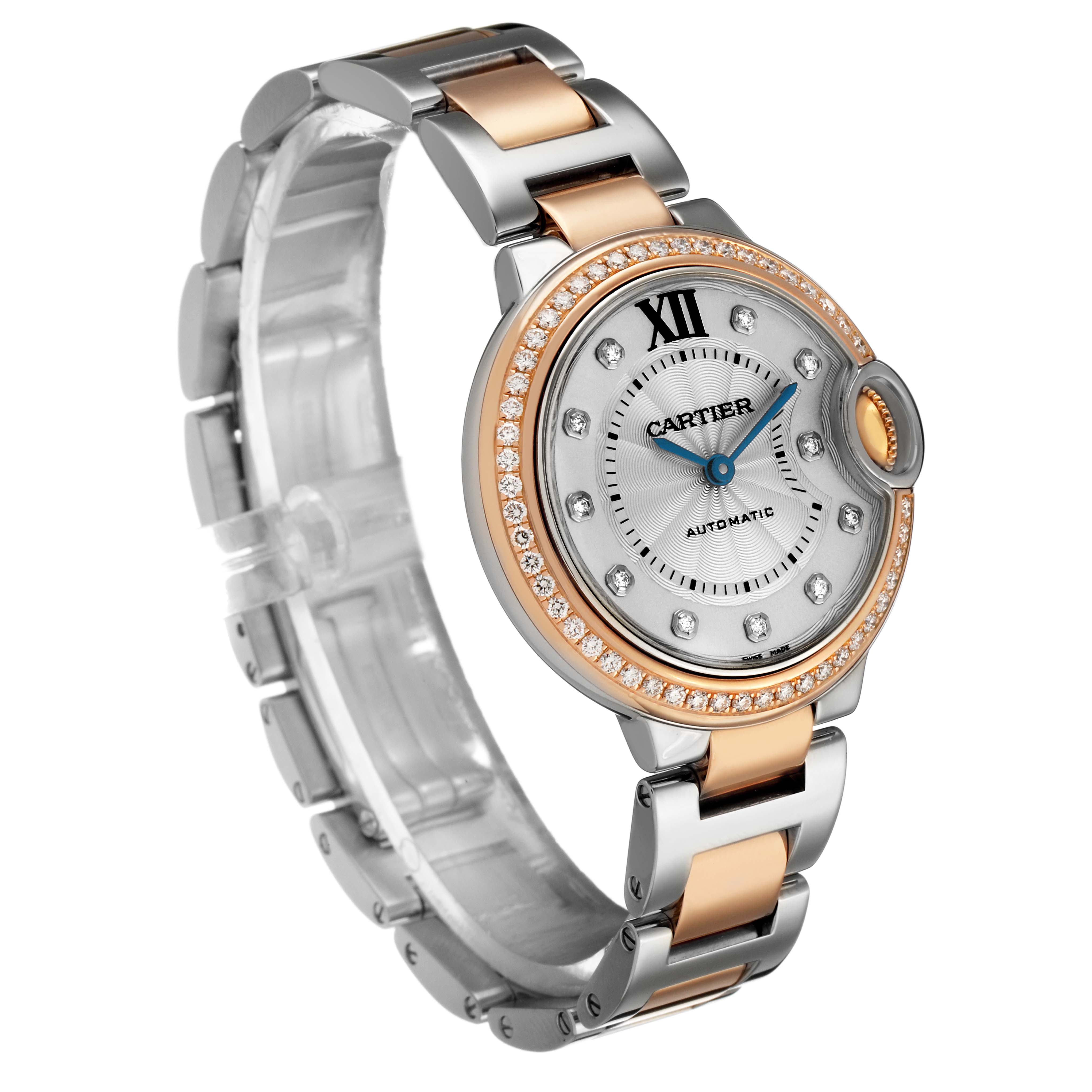 The image shows a Cartier Ballon Bleu WE902077 Women's Steel and Gold (two tone) Silver Dial watch angled to display the face, rose gold and stainless steel bracelet, and bezel with diamond accents.
