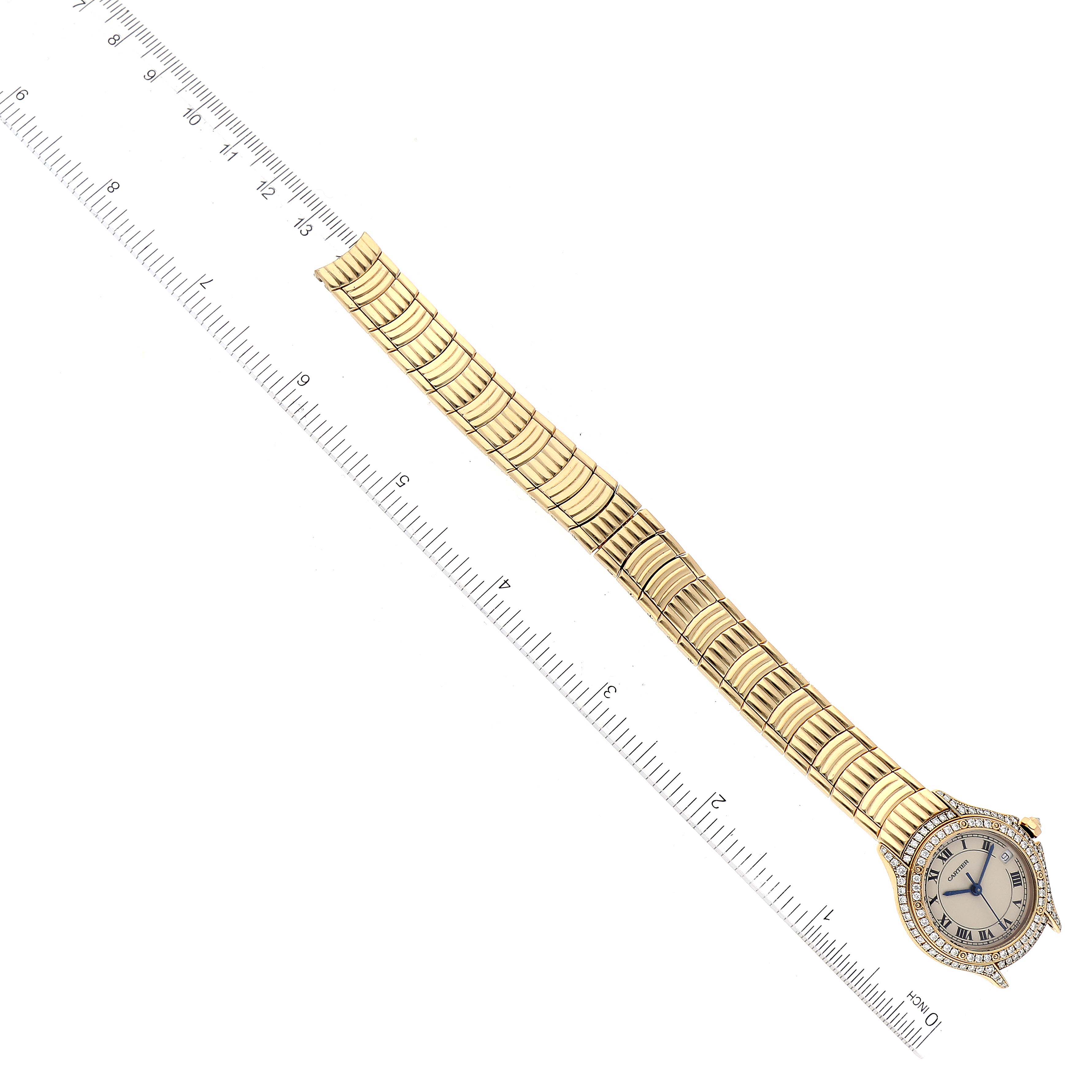 The image shows a Cartier Panthere 1171 1 Women's Yellow Gold Silver Dial 1171 1 Women's Yellow Gold Silver Dial watch laid flat diagonally with its full band extended, next to a measuring ruler.