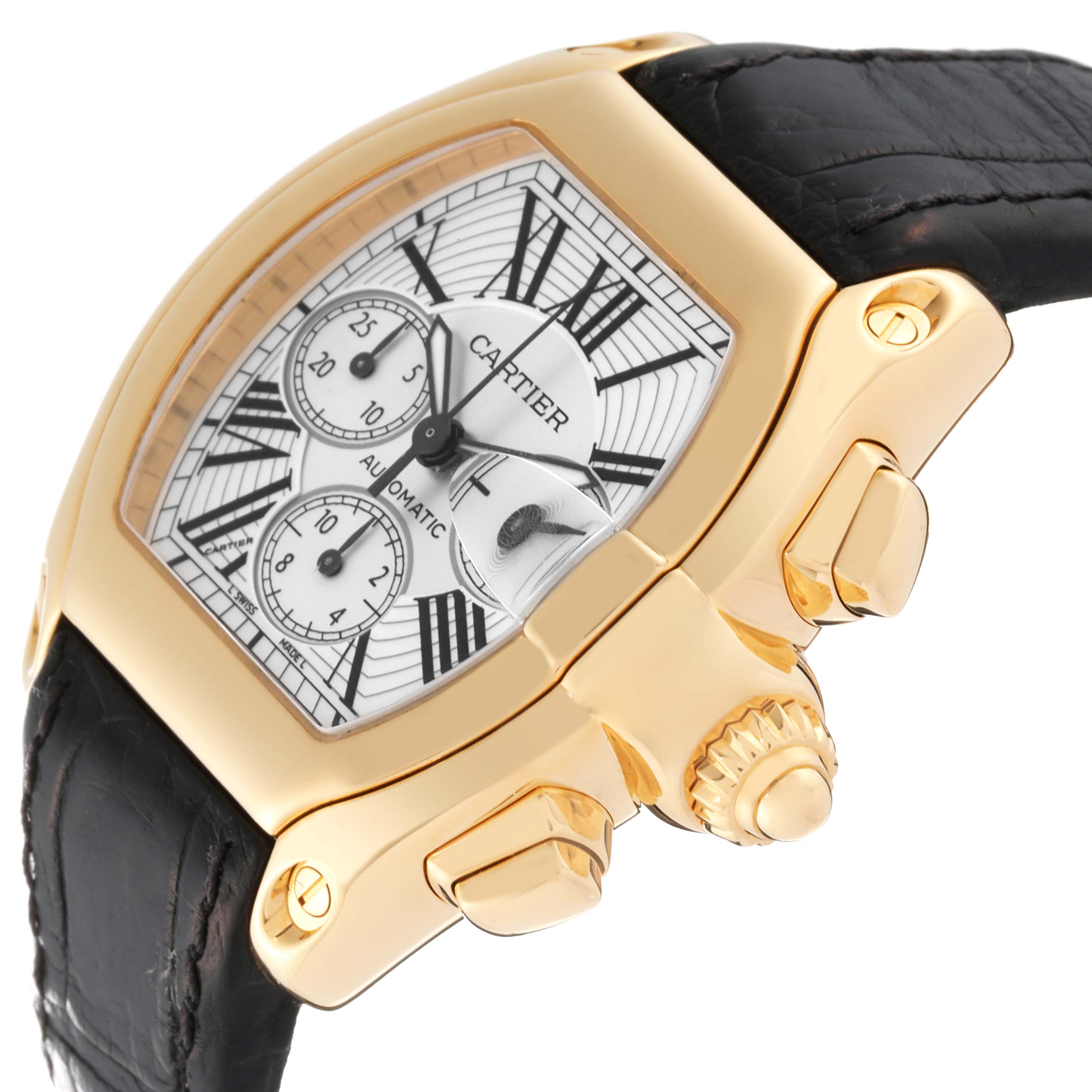 The Cartier Roadster W62021Y3 Men
s Yellow Gold Silver Dial W62021Y3 Men
s Yellow Gold Silver Dial watch is shown at an angle highlighting its face, crown, pushers, and part of the black strap.