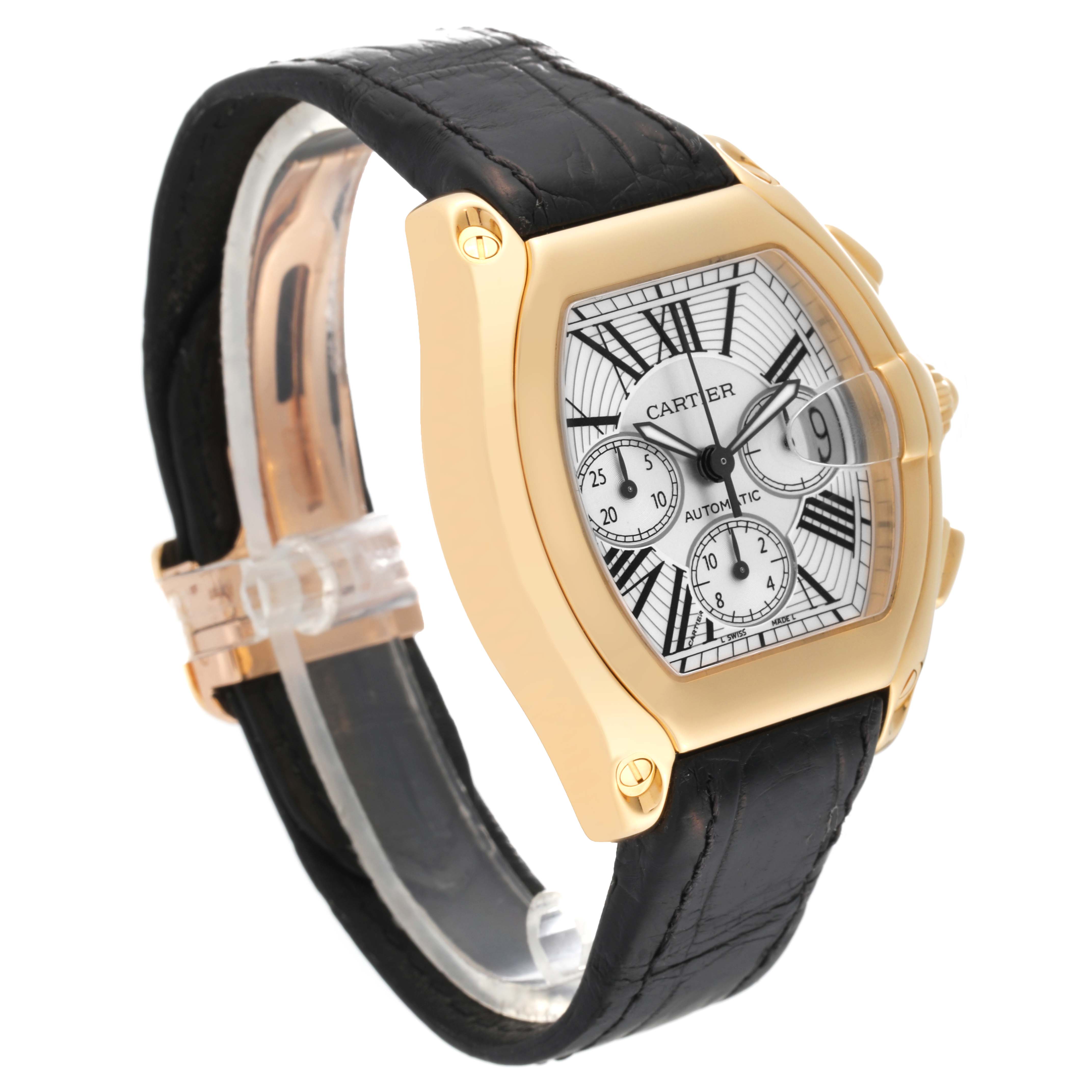 The Cartier Roadster W62021Y3 Men
s Yellow Gold Silver Dial W62021Y3 Men
s Yellow Gold Silver Dial watch is shown at an angle highlighting its gold case, black leather strap, and detailed dial.