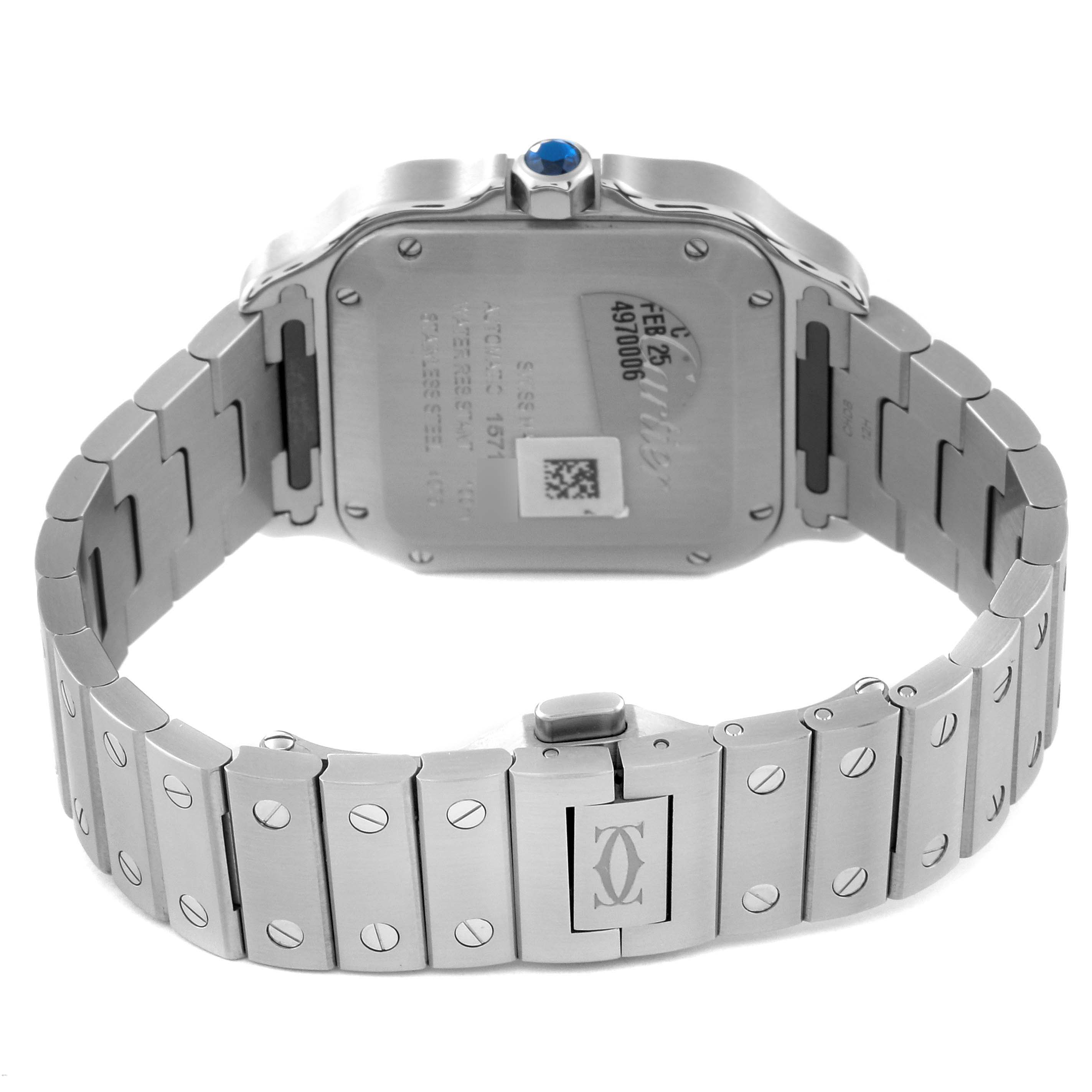 The image shows the back case and metal bracelet of a Cartier Santos WSSA0063 Men's Stainless Steel Blue Dial WSSA0063 Men's Stainless Steel Blue Dial watch, viewed at an angle highlighting the crown and clasp.