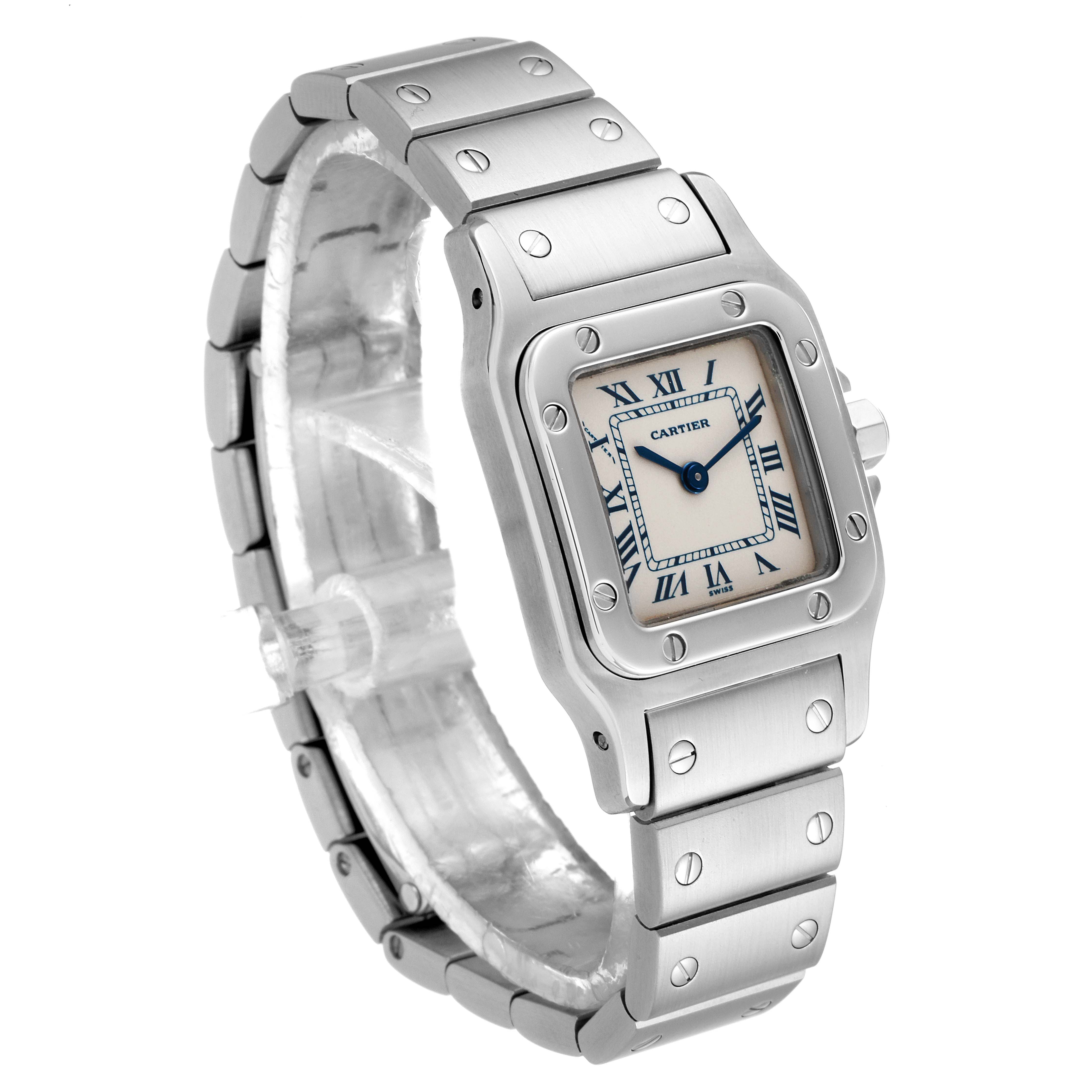 The image displays a Cartier Santos W20056D6 Women's Stainless Steel Silver Dial W20056D6 Women's Stainless Steel Silver Dial watch from an angled side view, showcasing the face, bezel, strap, and screws.