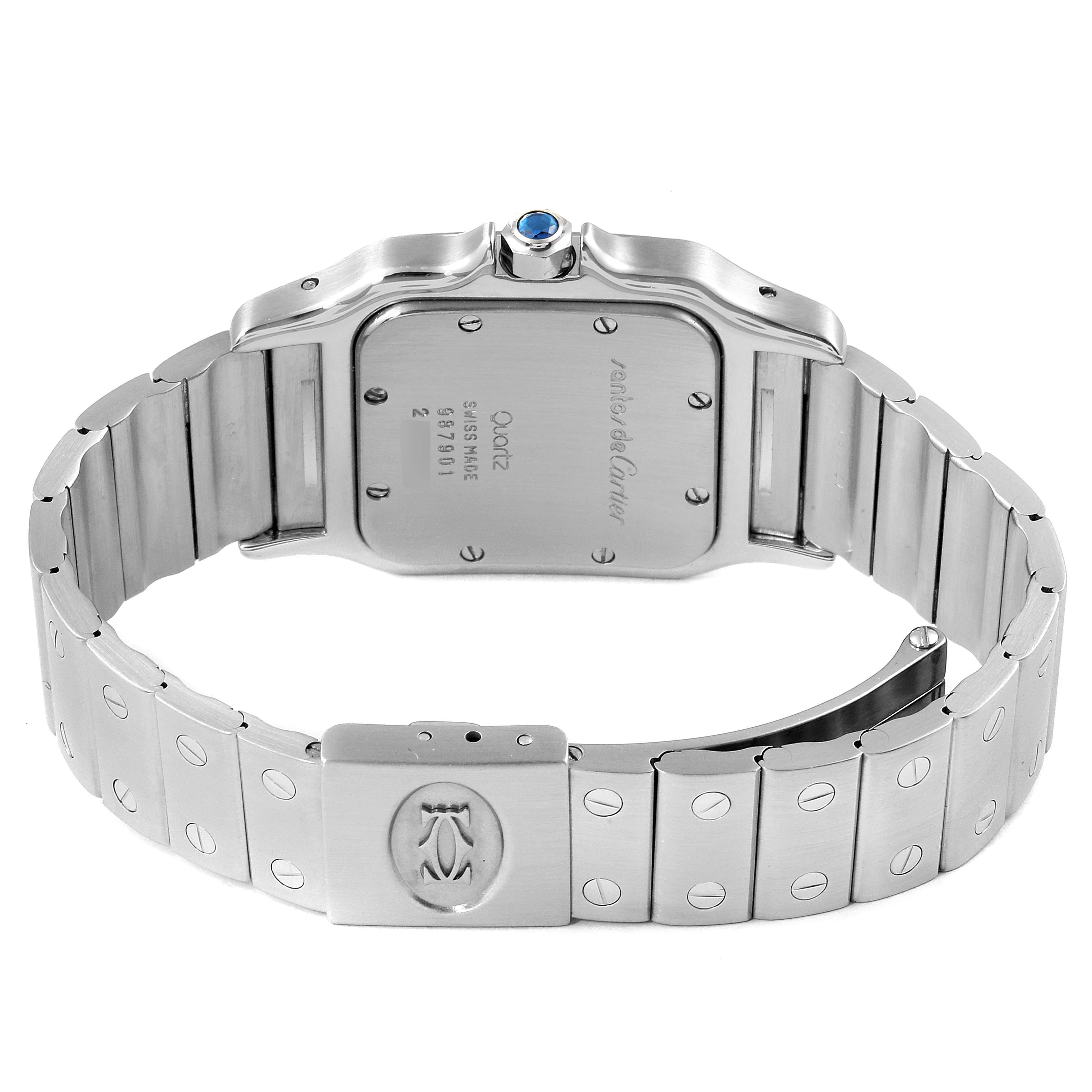 The image shows the back case and bracelet of a Cartier Santos 987901 Men's Stainless Steel Silver Dial 987901 Men's Stainless Steel Silver Dial watch with the clasp open.