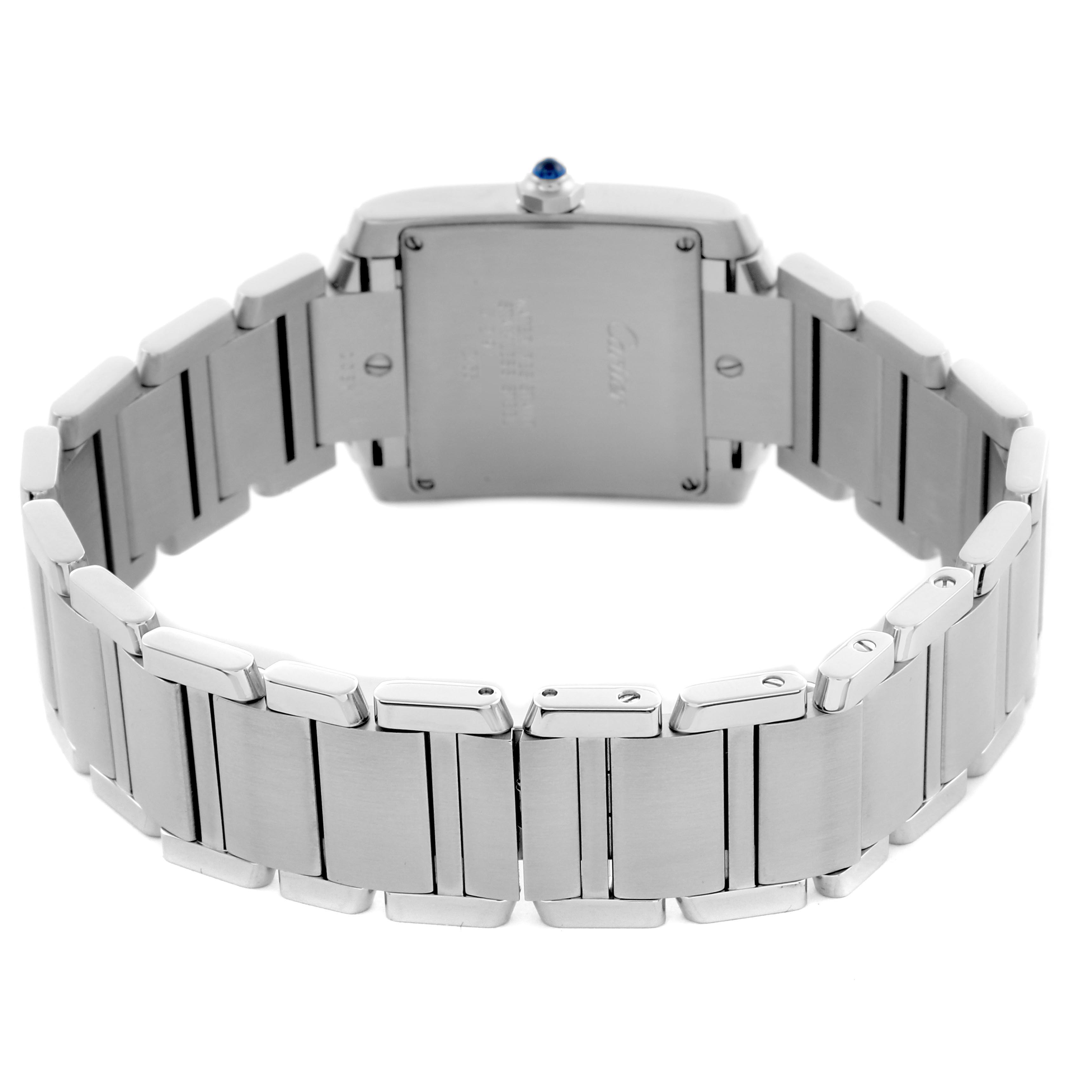 The image shows the back view of the Cartier Tank Française watch, highlighting the caseback and metal bracelet.