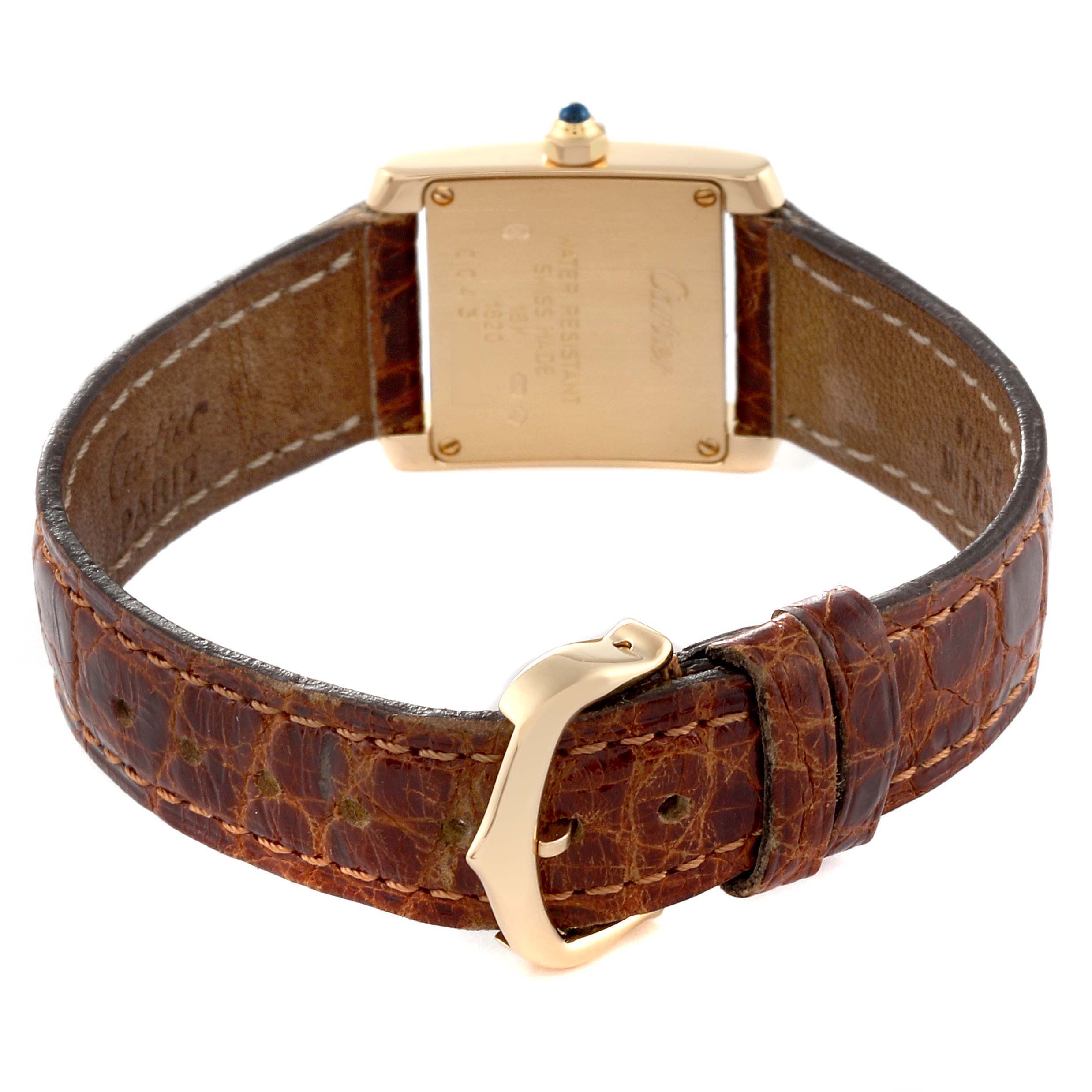 The Cartier Tank Francaise W5000256 Women's Yellow Gold Silver Dial W5000256 Women's Yellow Gold Silver Dial watch is shown from the back, focusing on the case back, leather strap, and buckle.