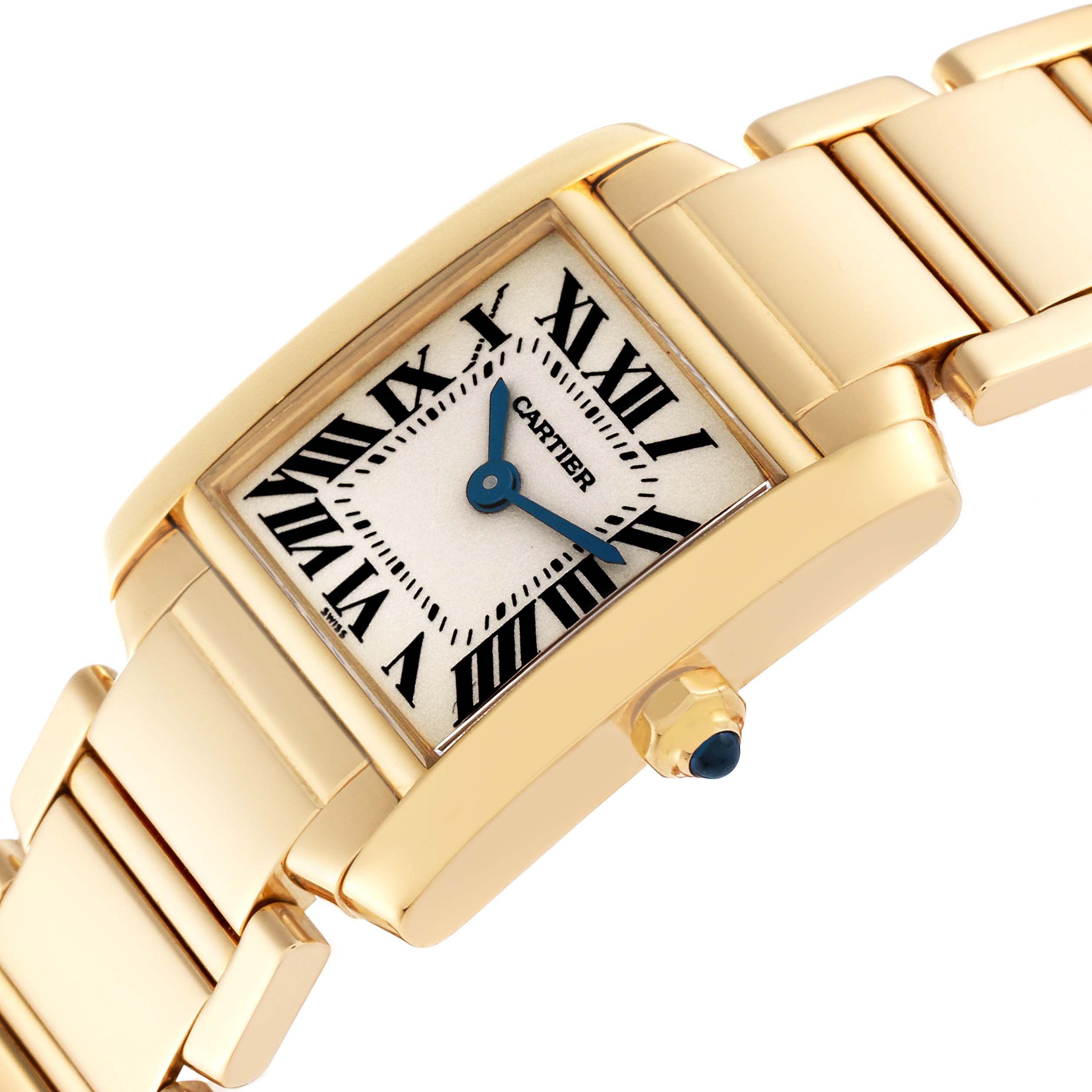 The image shows a close-up angle of the Cartier Tank Francaise W50002N2 Women's Yellow Gold Silver Dial W50002N2 Women's Yellow Gold Silver Dial watch, highlighting its face, Roman numerals, and bracelet.