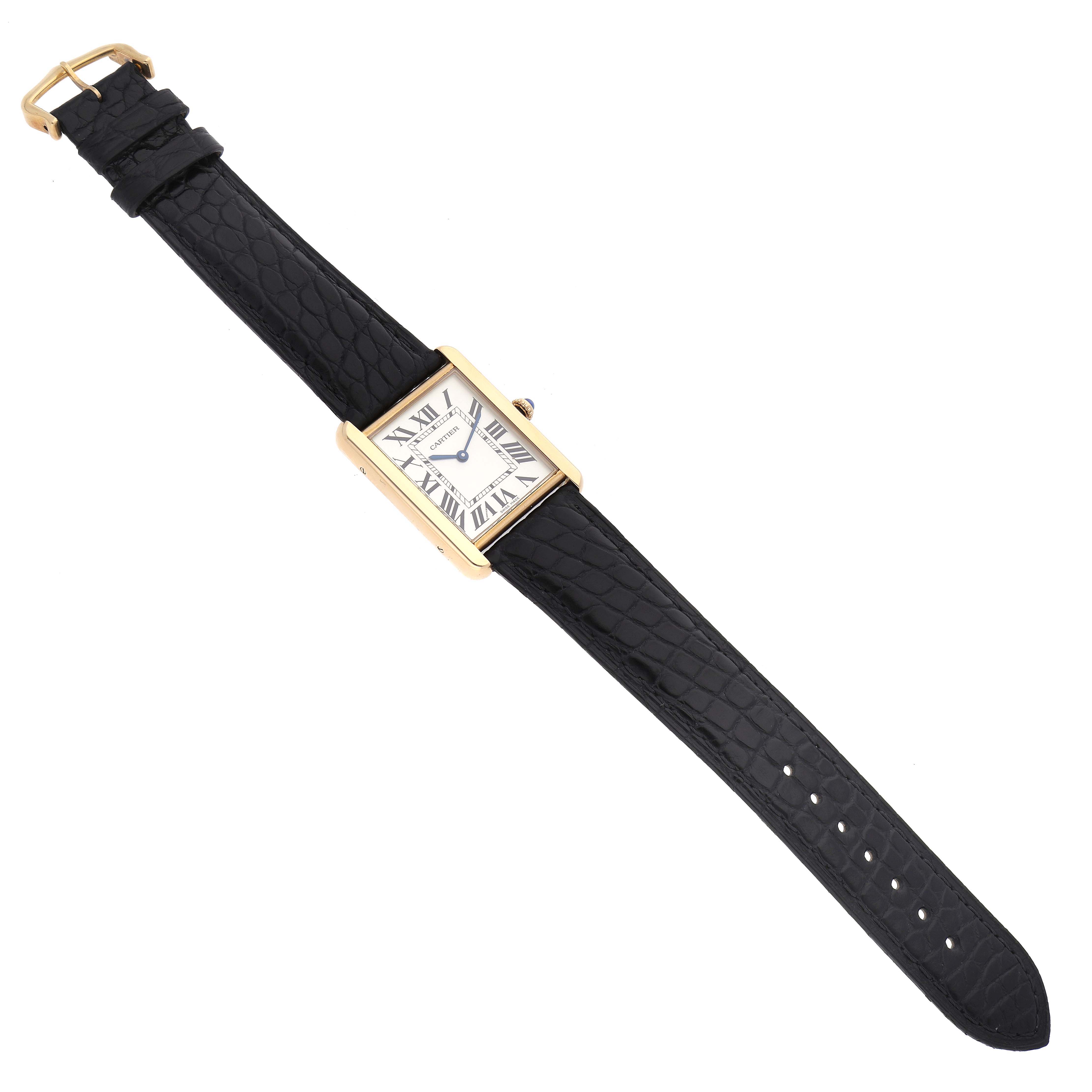 The image shows a Cartier Tank Solo W5200004 Men
s Steel and Gold (two tone) Silver Dial W5200004 Men
s Steel and Gold (two tone) Silver Dial watch from a top-down angle, highlighting its rectangular face and black leather strap.