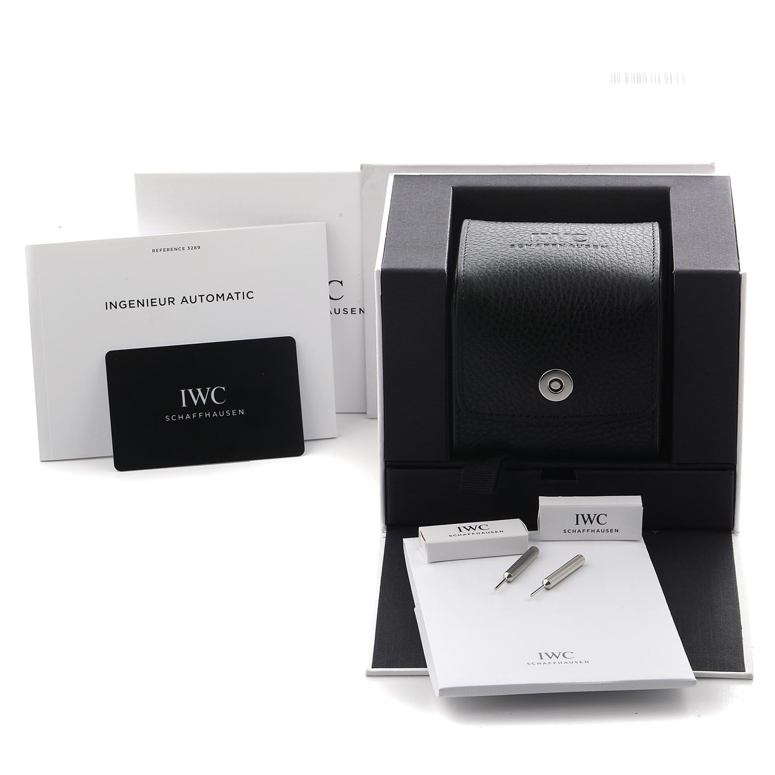 The image shows the IWC Ingenieur IW328902 Men's Stainless Steel Silver Dial IW328902 Men's Stainless Steel Silver Dial watch packaging, manuals, warranty card, and strap tools from a frontal angle.