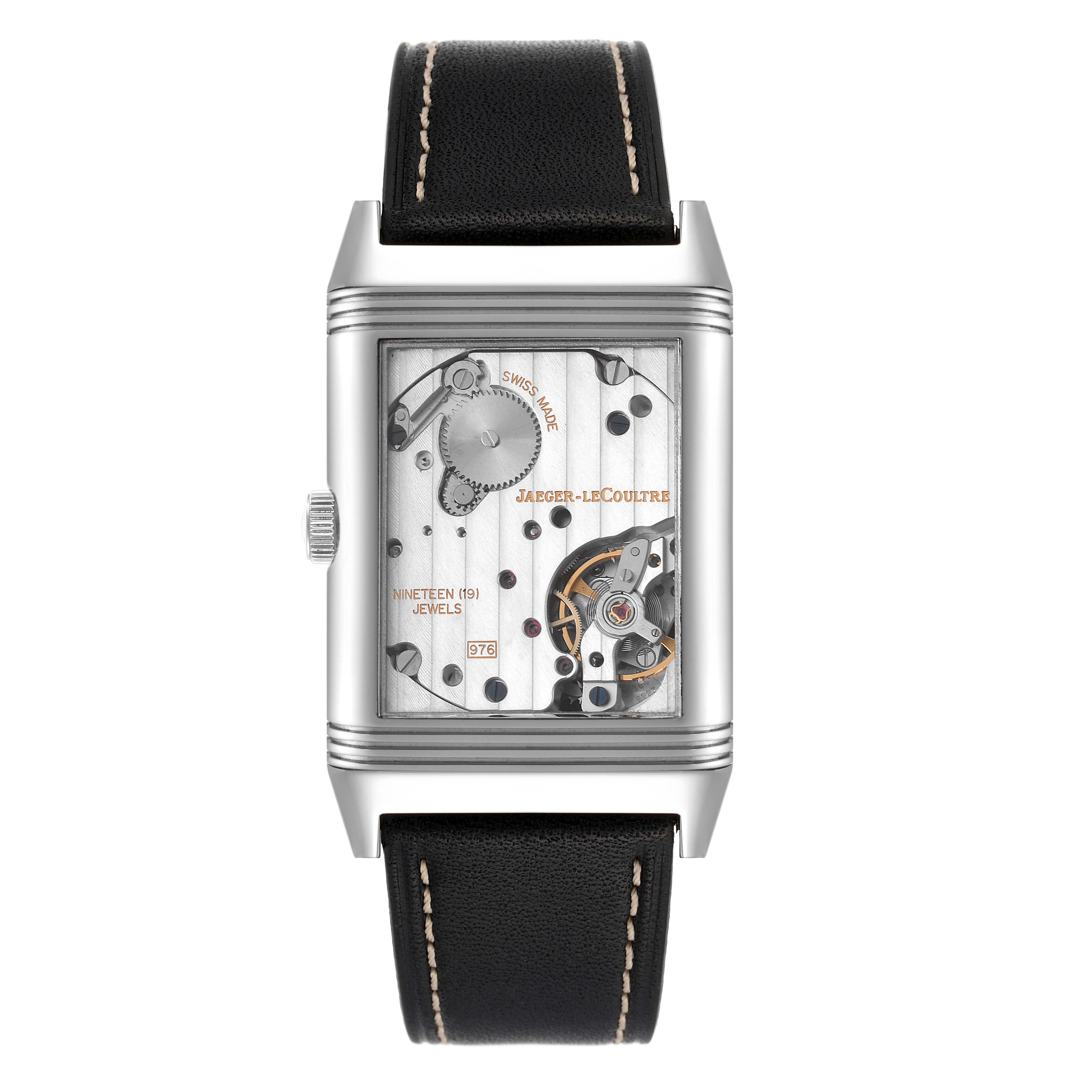 The image shows the front view of the Jaeger-LeCoultre Reverso watch, highlighting its mechanical movement and dial details.
