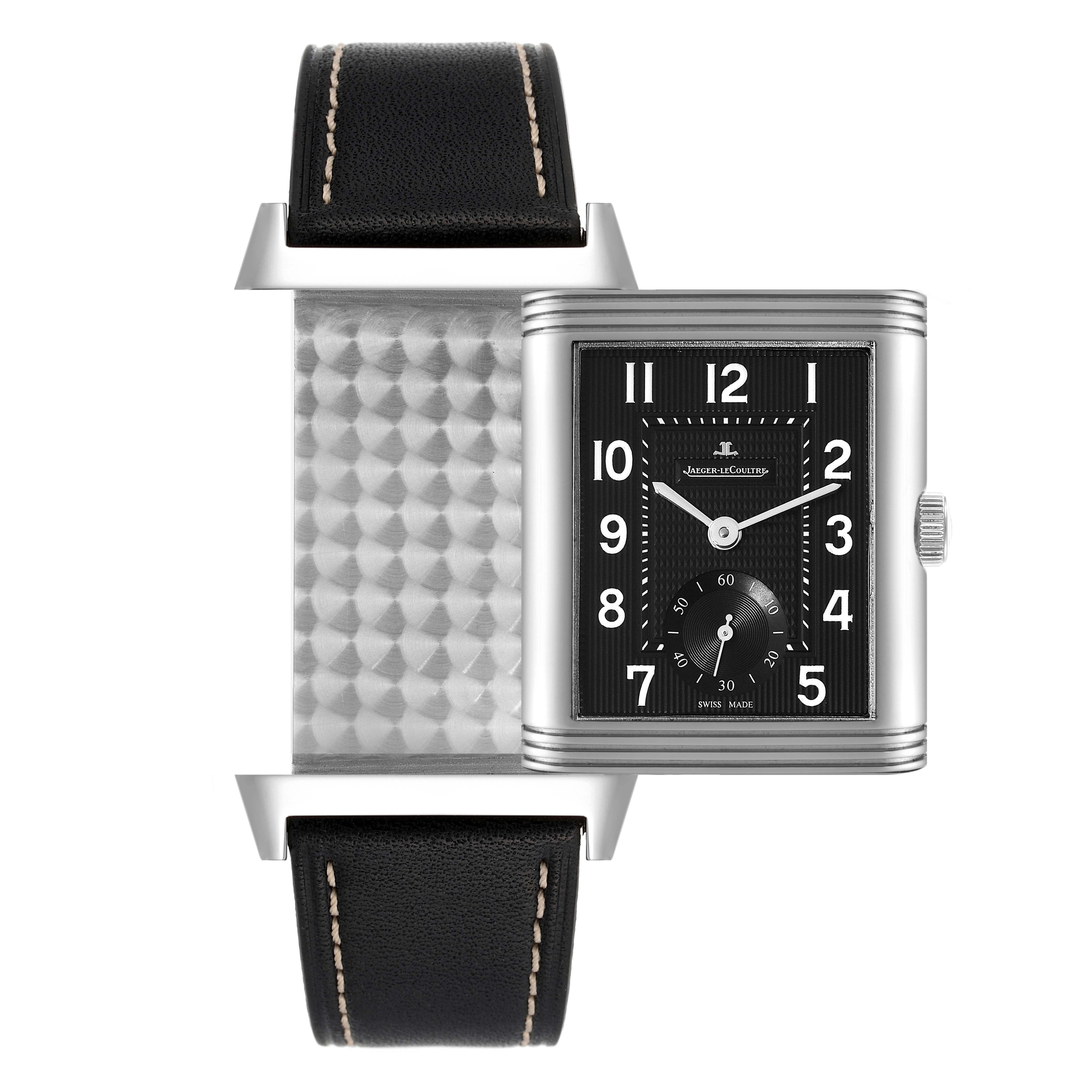 The image shows a Jaeger-LeCoultre Reverso watch in a front angle, displaying its black dial, numerals, and black leather strap.