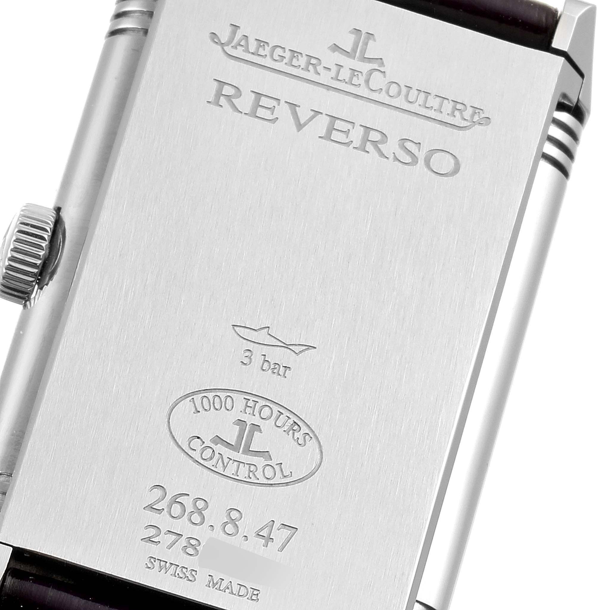 The image shows the back panel of a Jaeger LeCoultre Reverso 268.8.47 Women's Stainless Steel Silver Dial 268.8.47 Women's Stainless Steel Silver Dial watch, displaying the branding and specifications.